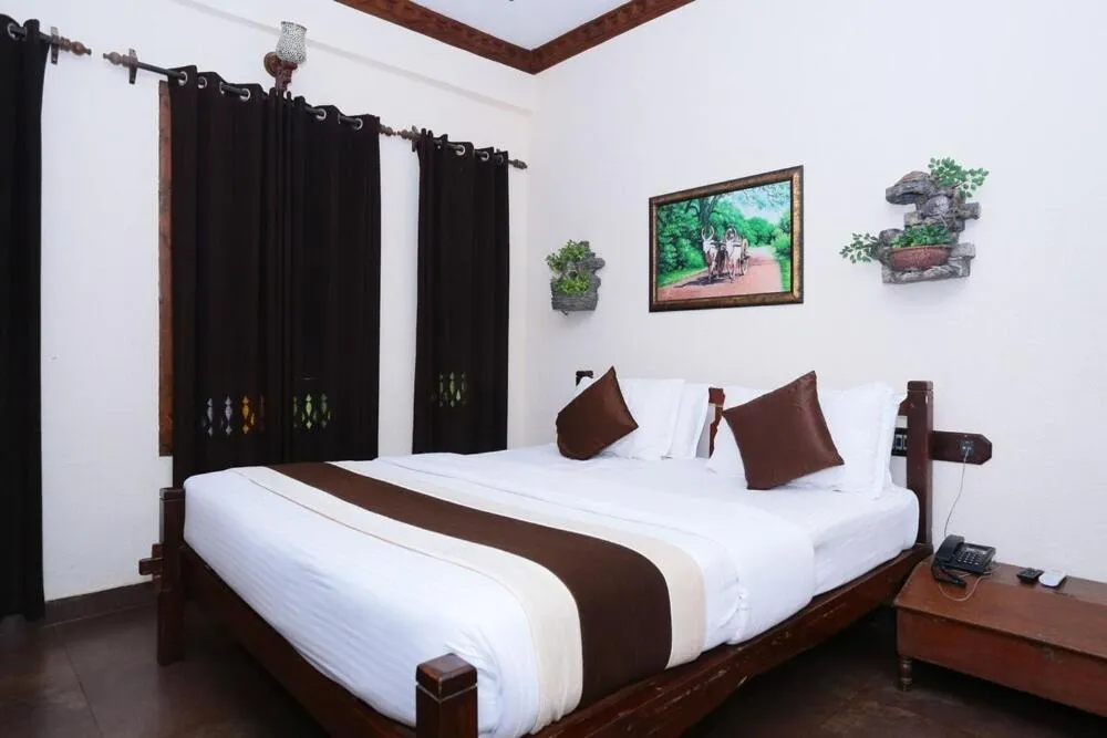 Bedroom, Bed in Kovalam Beach Hotel