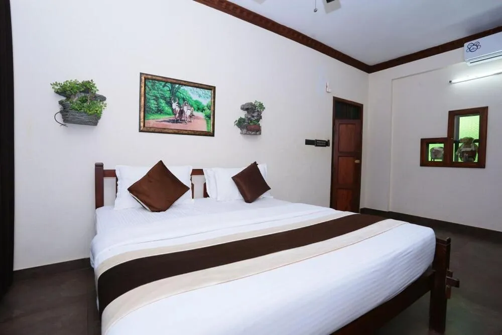 Photo of the whole room, Bed in Kovalam Beach Hotel