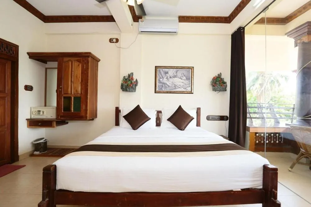 Bedroom, Bed in Kovalam Beach Hotel