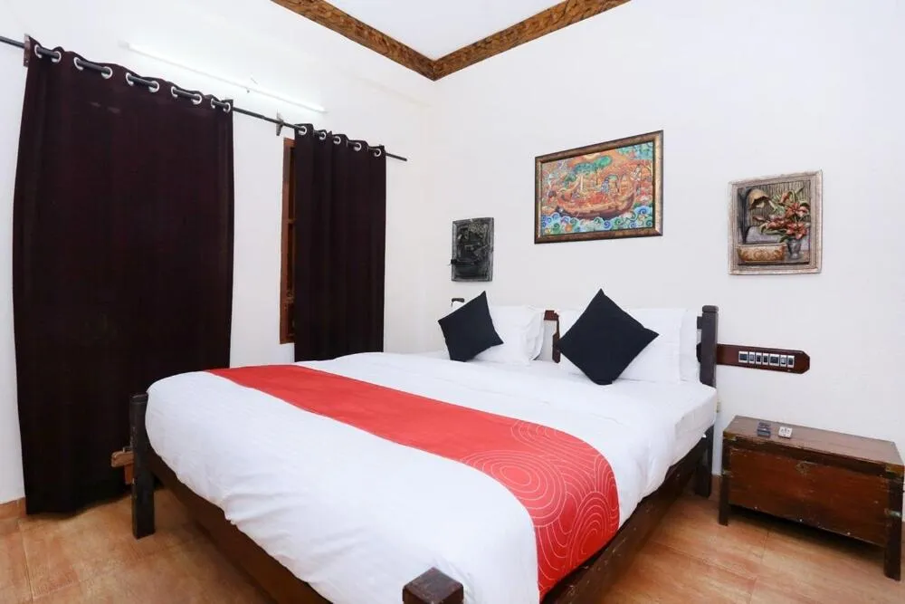 Photo of the whole room, Bed in Kovalam Beach Hotel