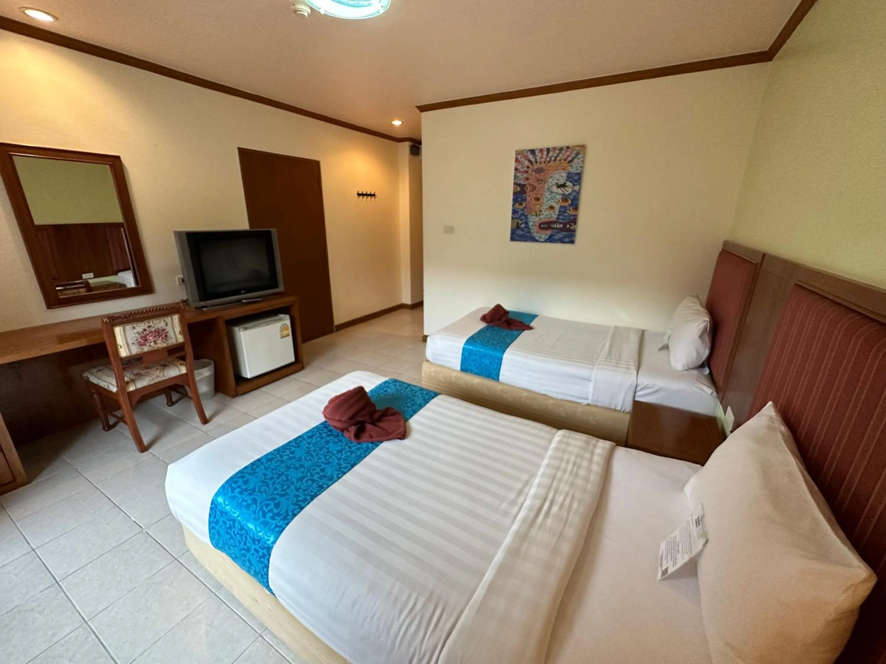 Photo of the whole room, Bed in Thipurai Beach Hotel