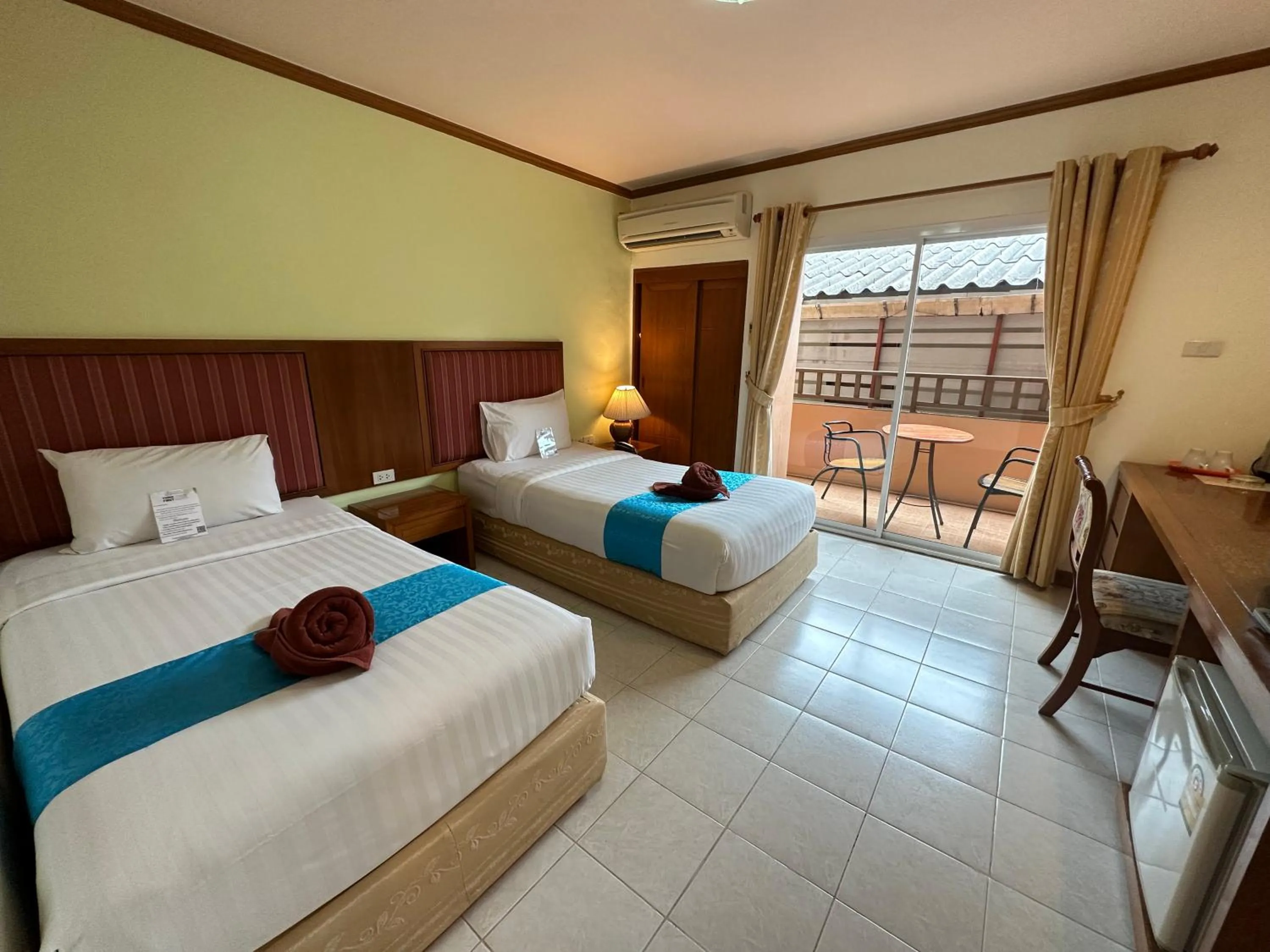 Photo of the whole room, Bed in Thipurai Beach Hotel