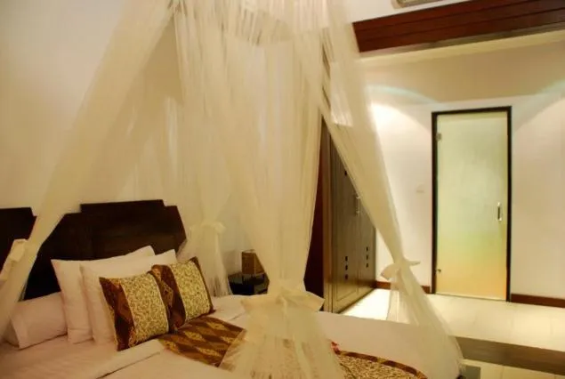 Bed in Villa Cantik Tresna