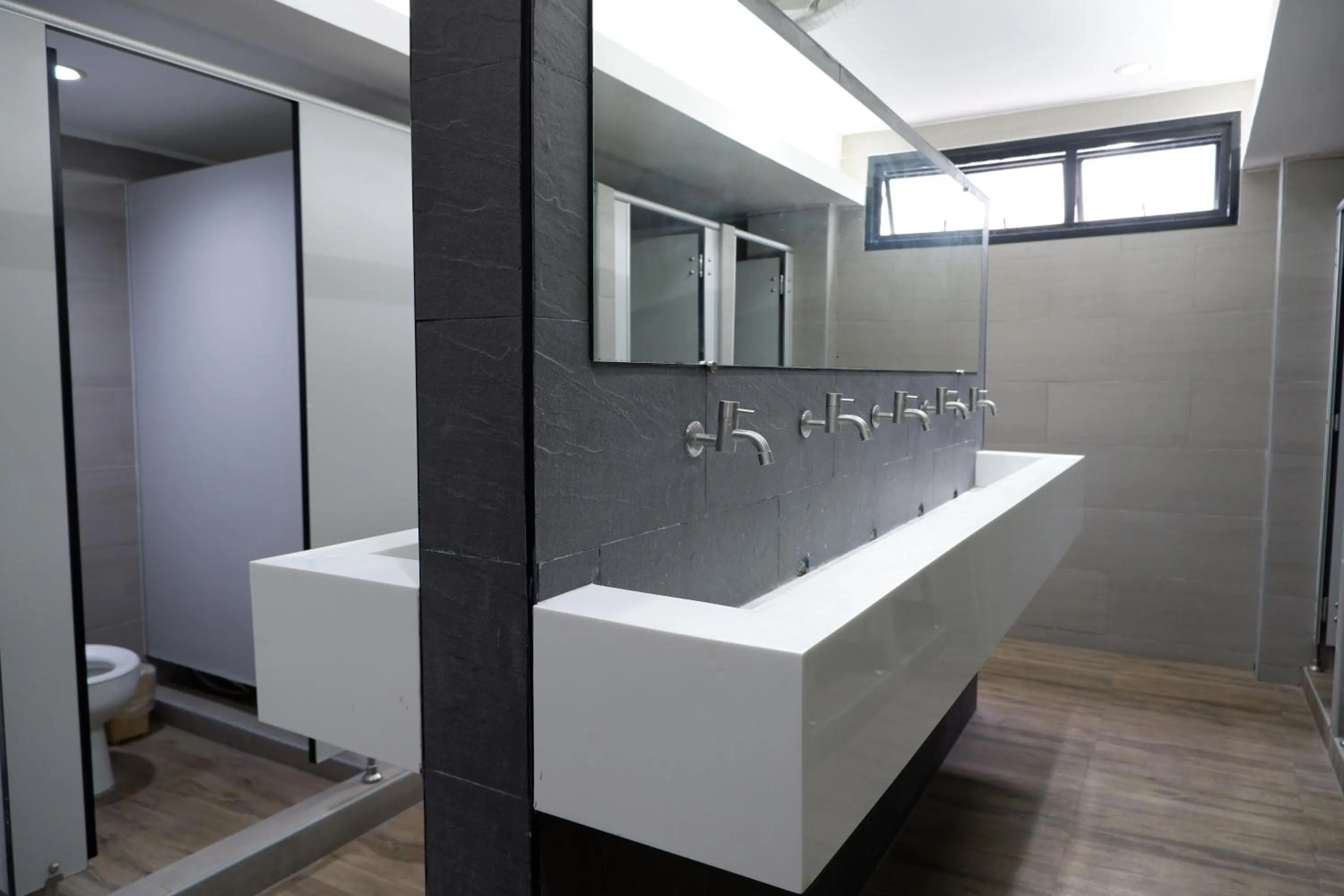 Public Bath in 18 Coins Budget Hotel