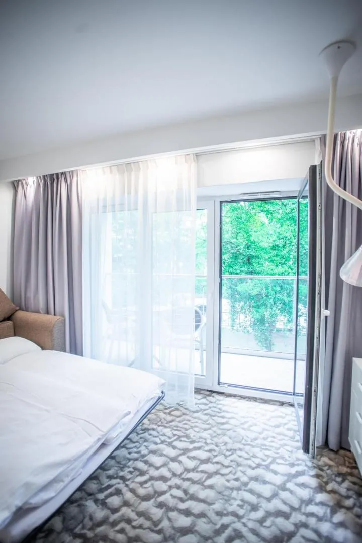 Garden view, Bed in West Baltic Resort Wellness & Spa