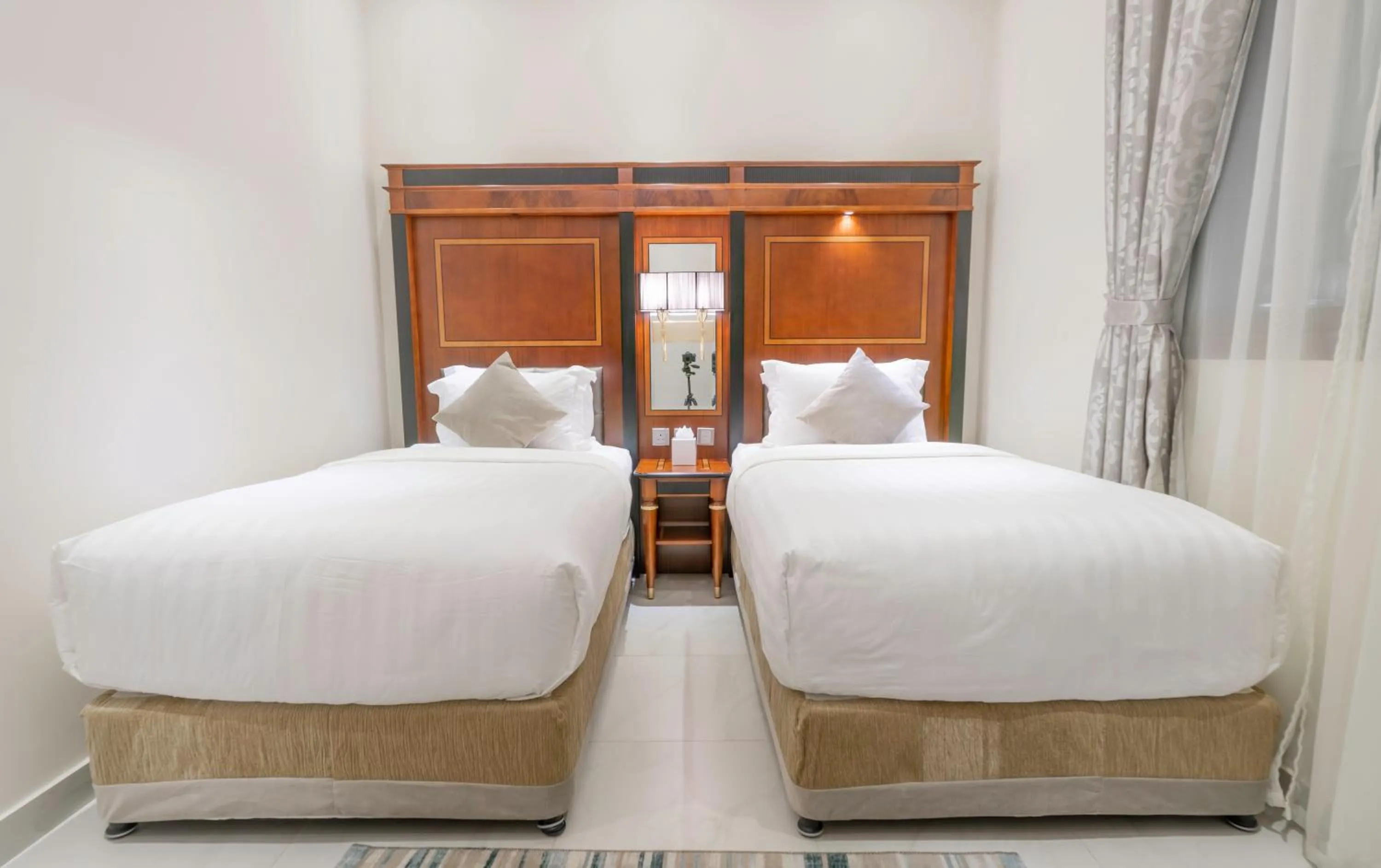 Bed in Makeen Homes by Warwick Hotel