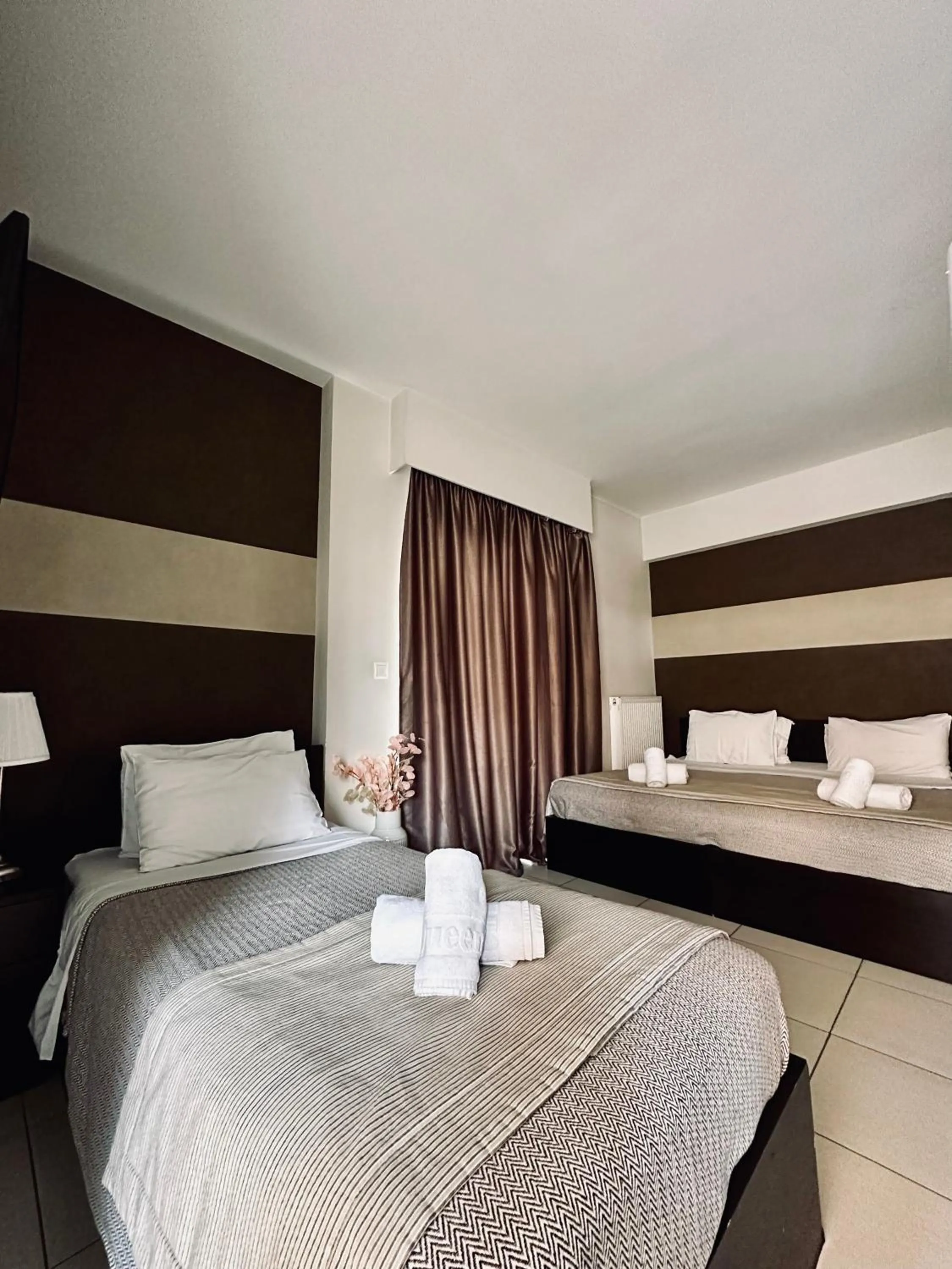 Bed in Mc Queen Rooms & Apartments