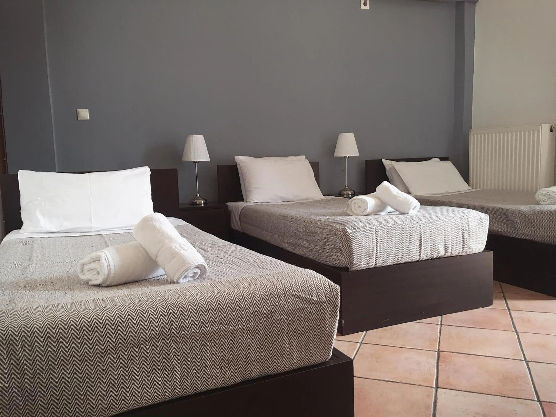 Photo of the whole room, Bed in Mc Queen Rooms & Apartments