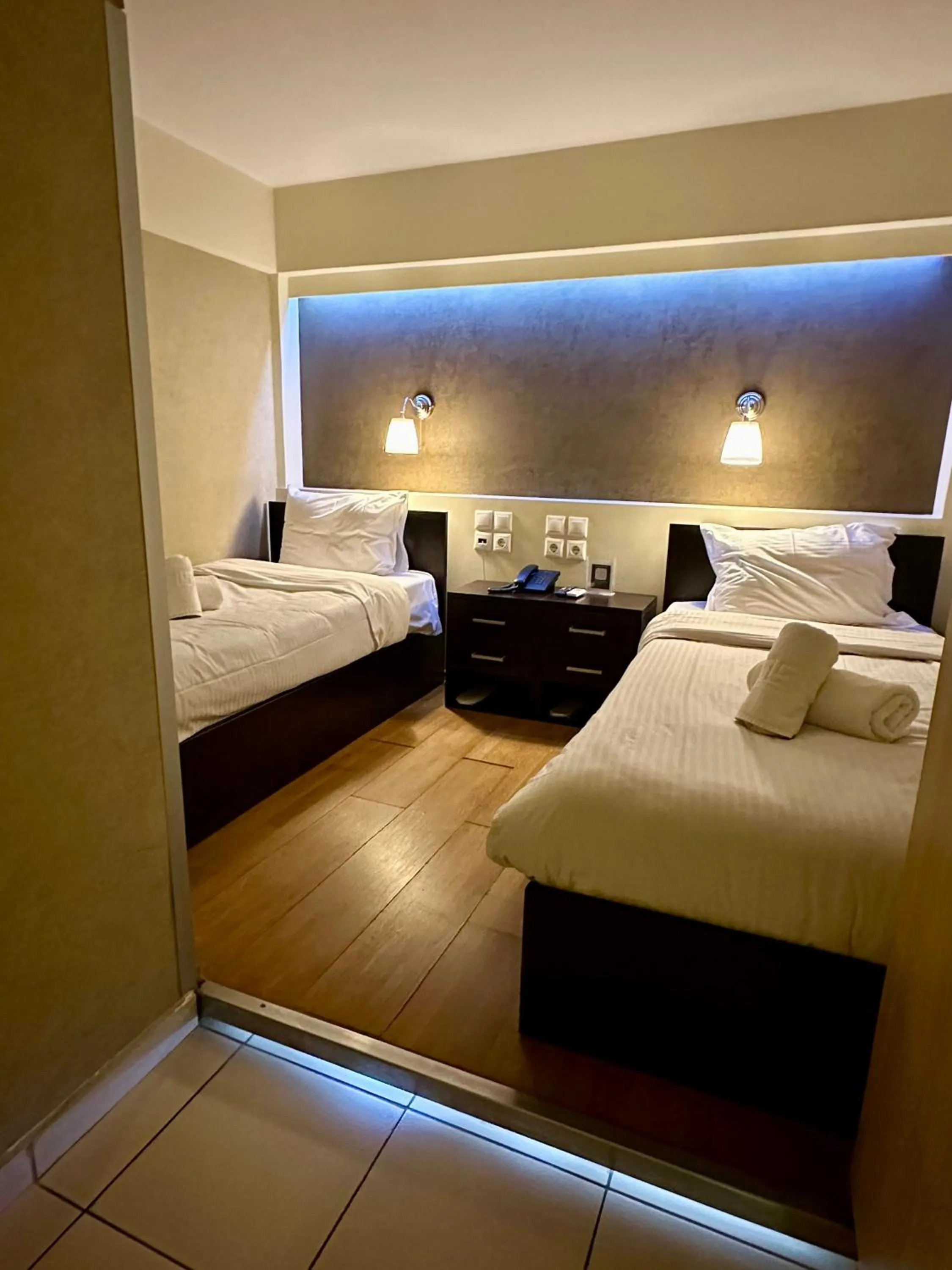 Bed in Mc Queen Rooms & Apartments