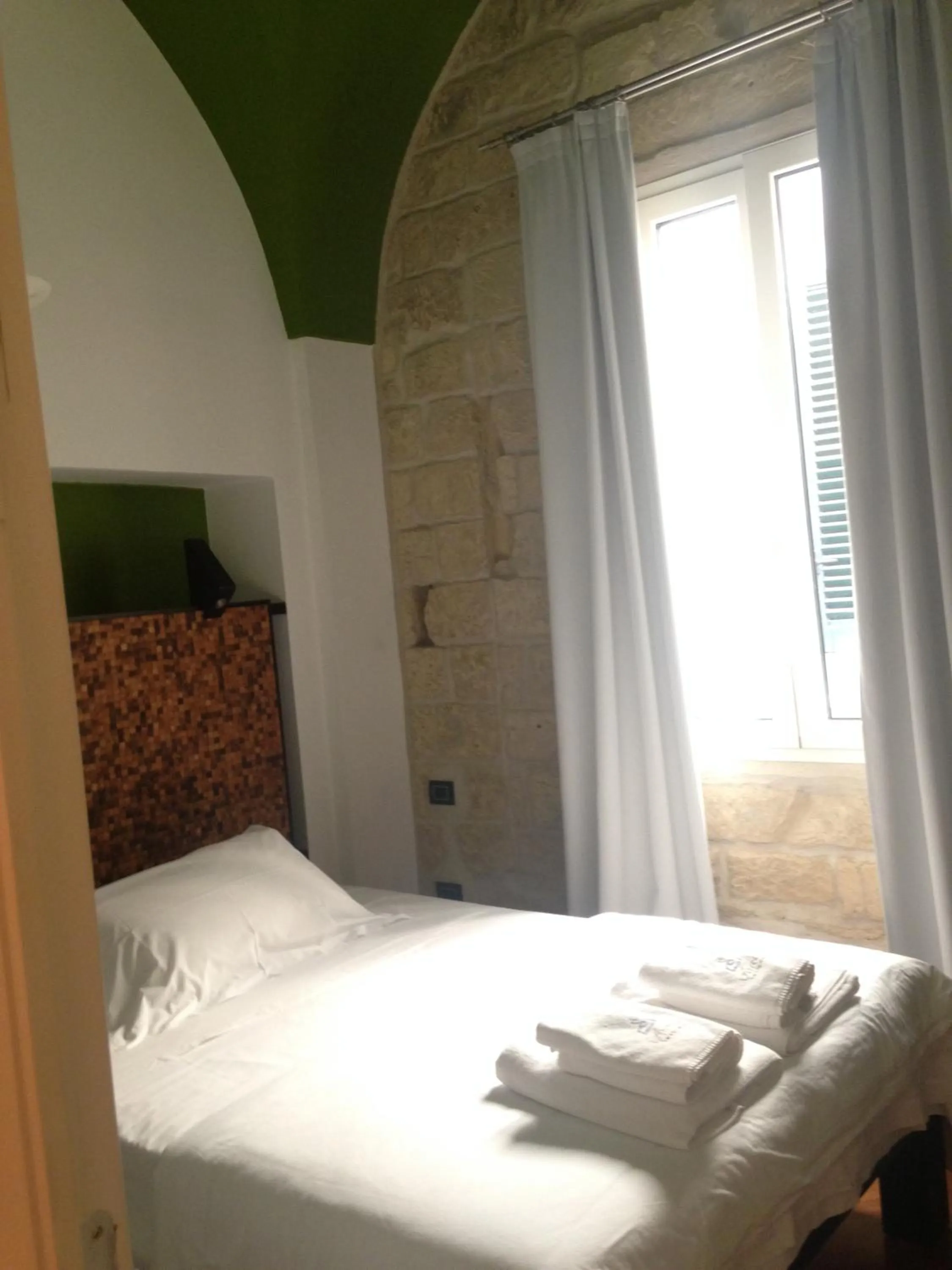 Bed in Alvino Suite And Breakfast