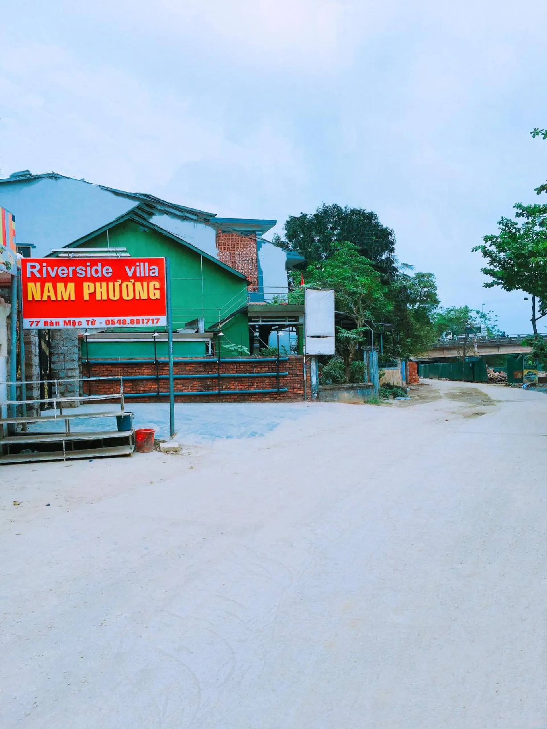 Property logo or sign in Nam Phương Riverside Villa