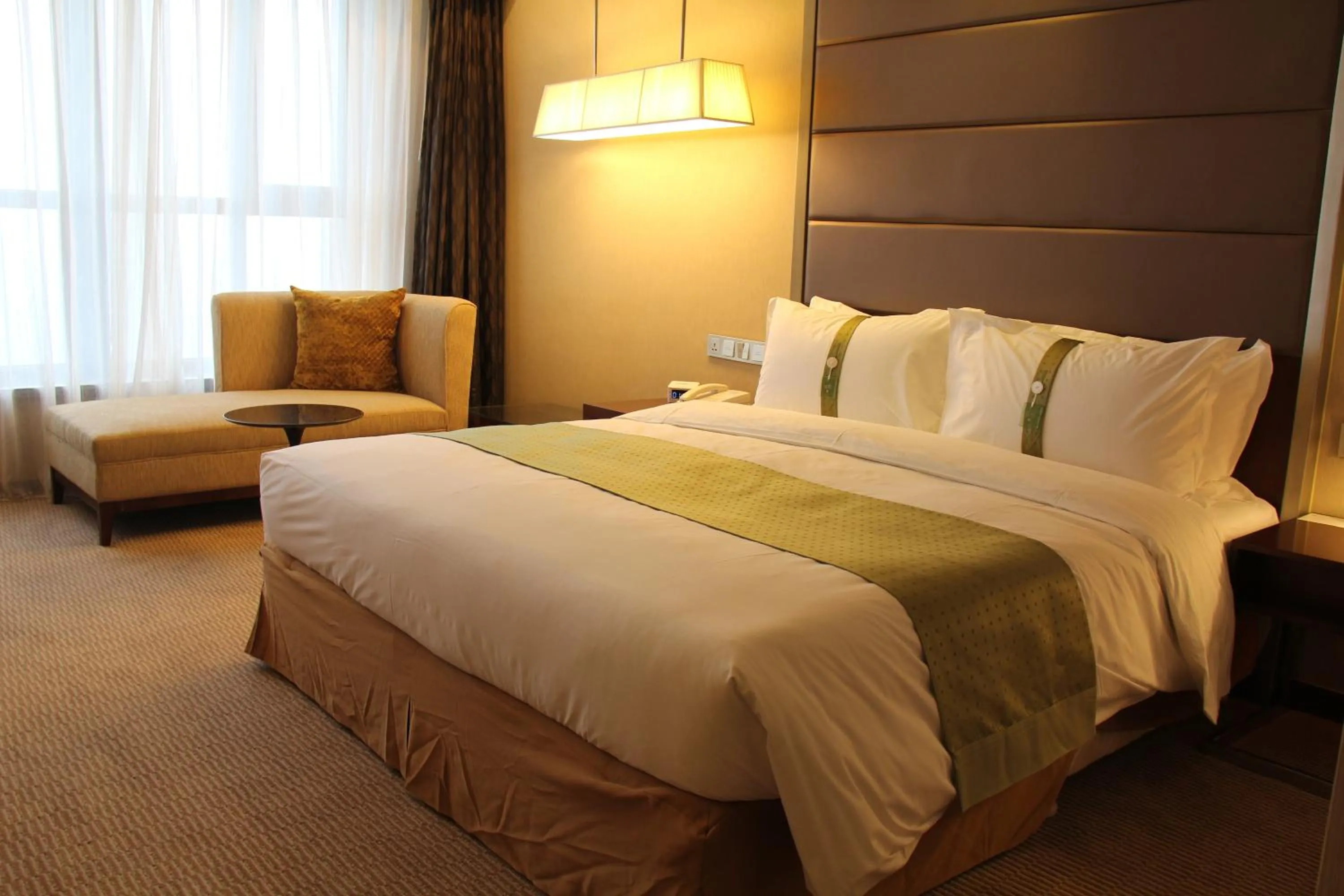 Bed in Holiday Inn Beijing Haidian, an IHG Hotel