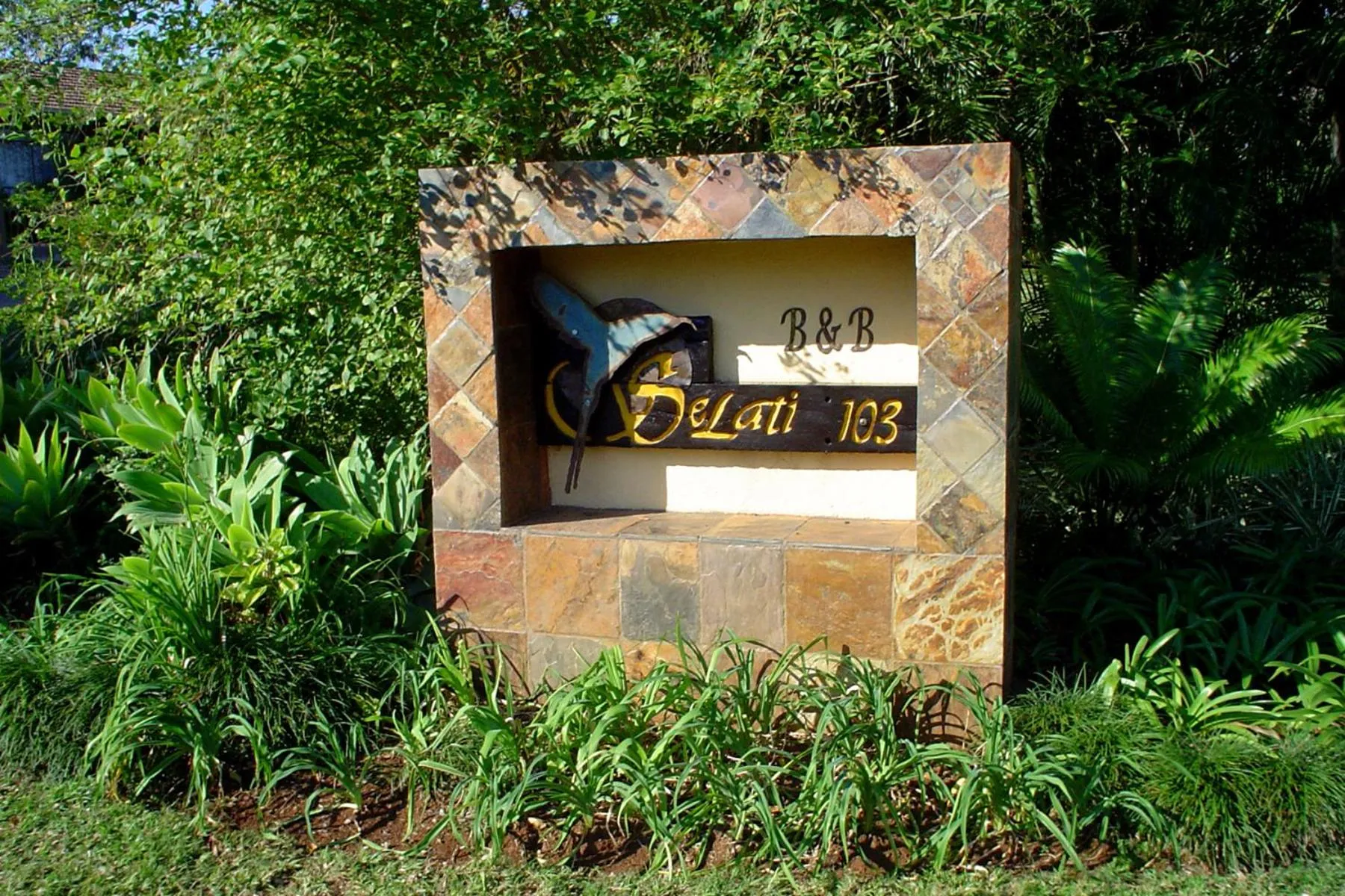 Property logo or sign in Selati 103 Guest Cottages