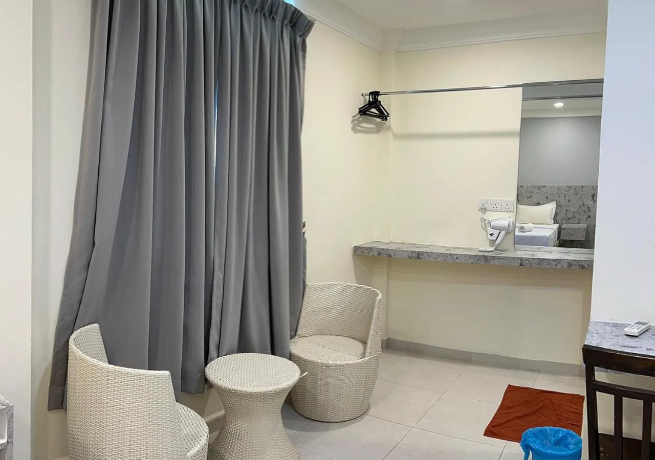 Seating area in D'Lima Beach Inn