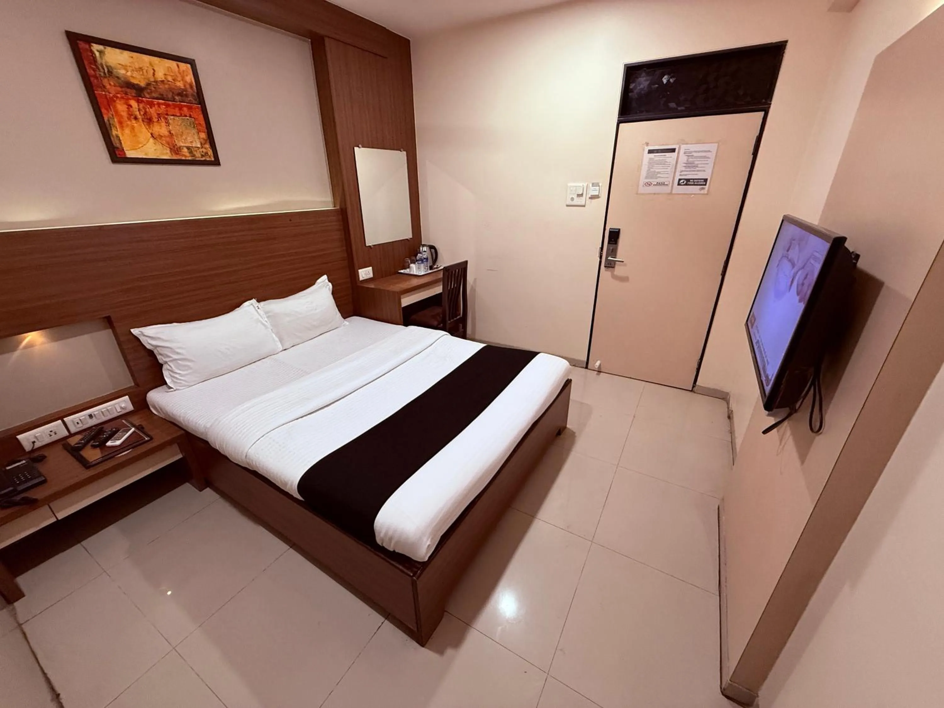 Bed in Hotel Alka Residency