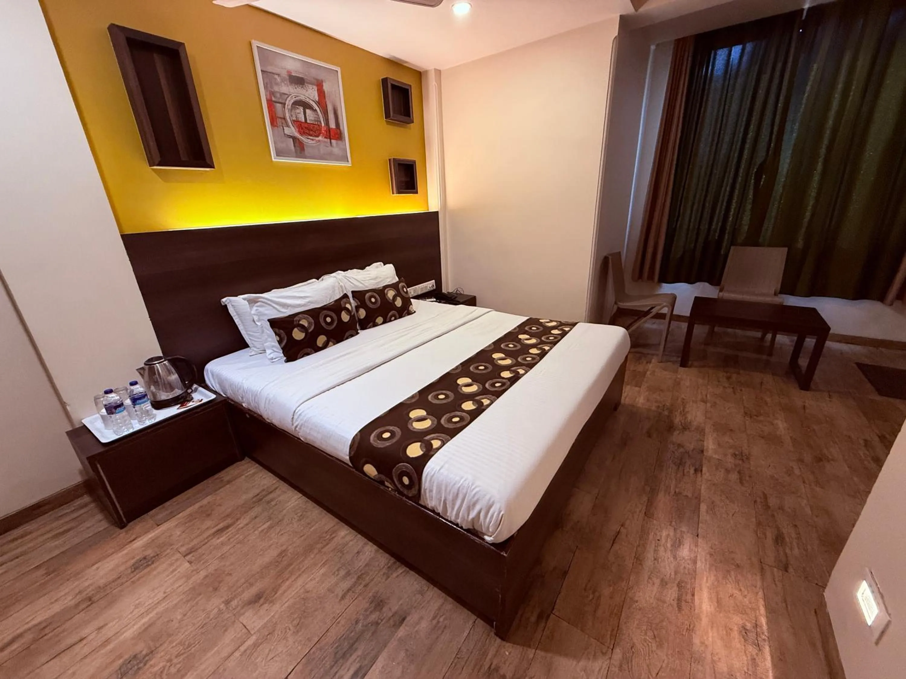 Bed in Hotel Alka Residency