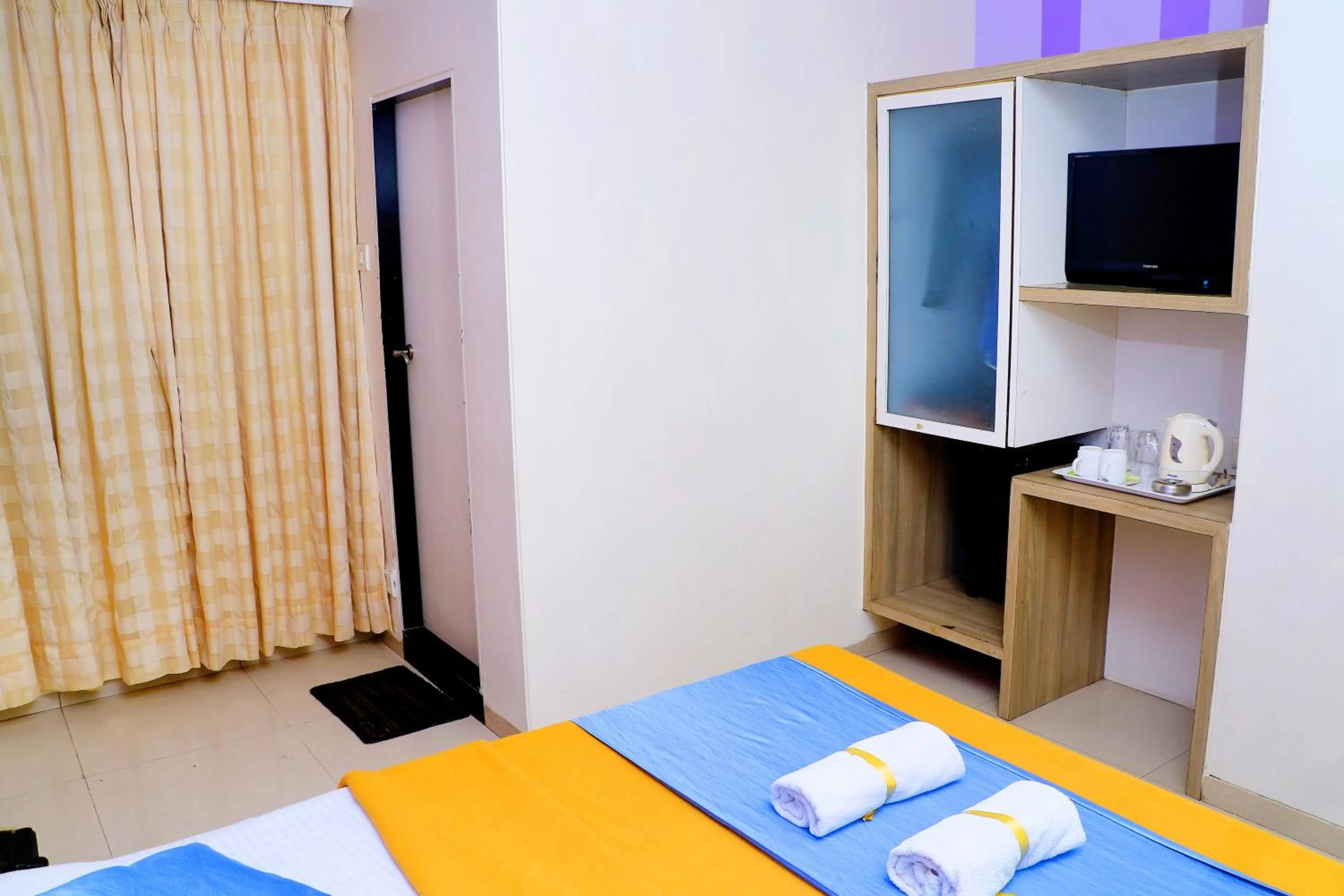 Bed in Hotel Alka Residency