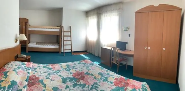 Bed in Garni Enrosadira