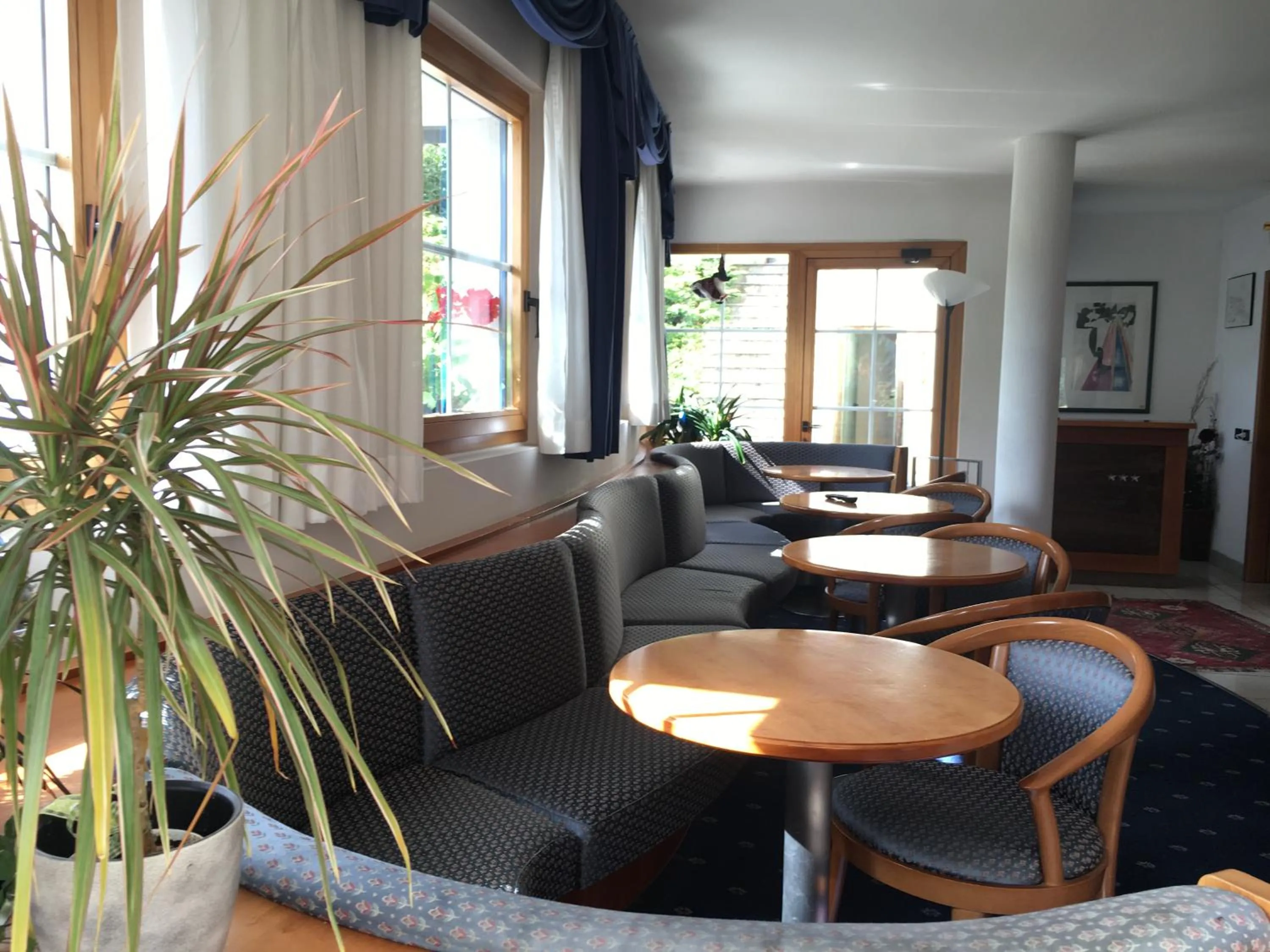 Communal lounge/ TV room in Garni Enrosadira