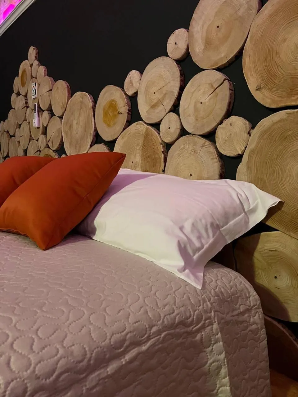 Bed in The Bridge Suites