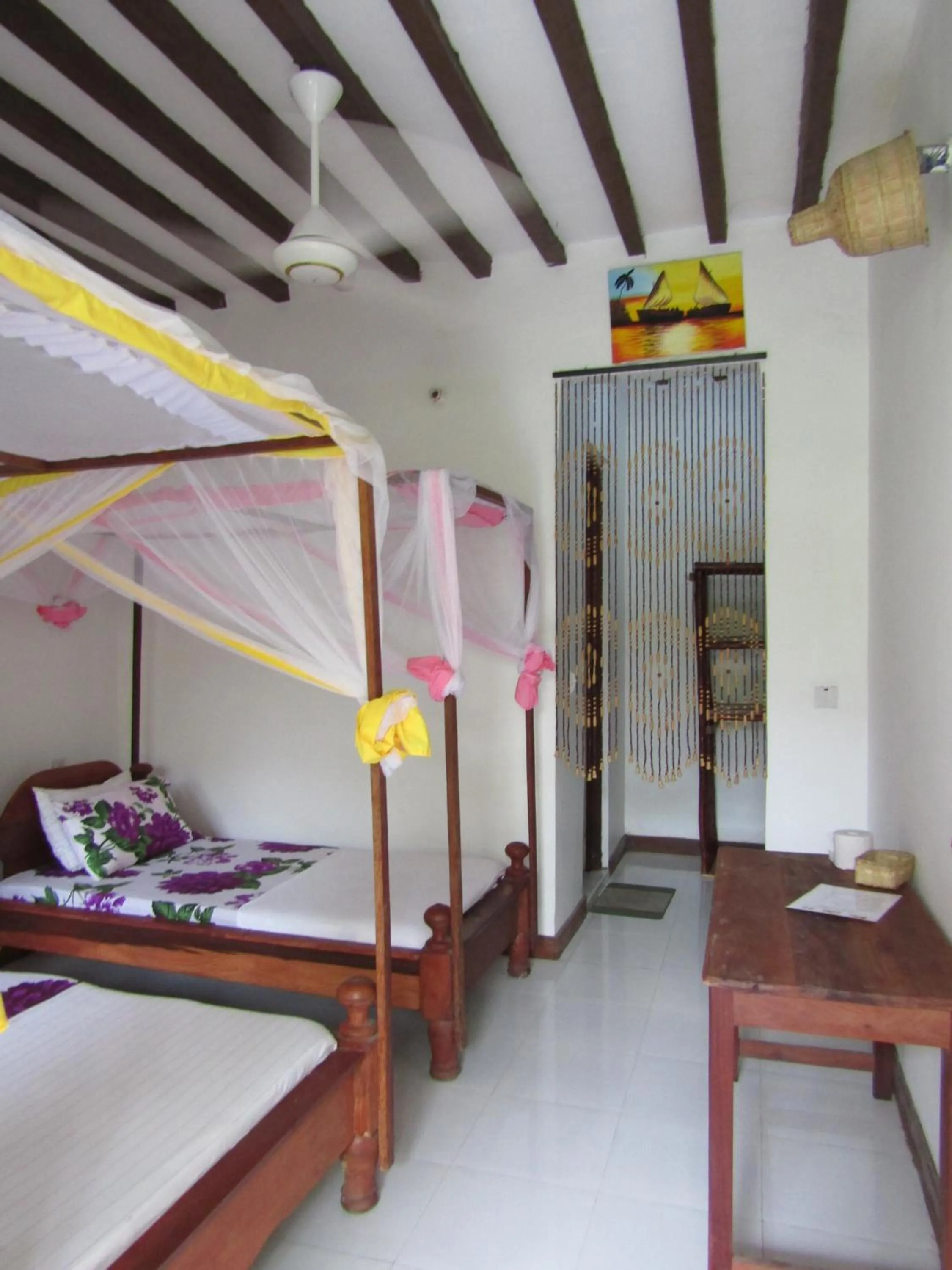 Photo of the whole room, Bed in Kivulini Lodge and Restaurant