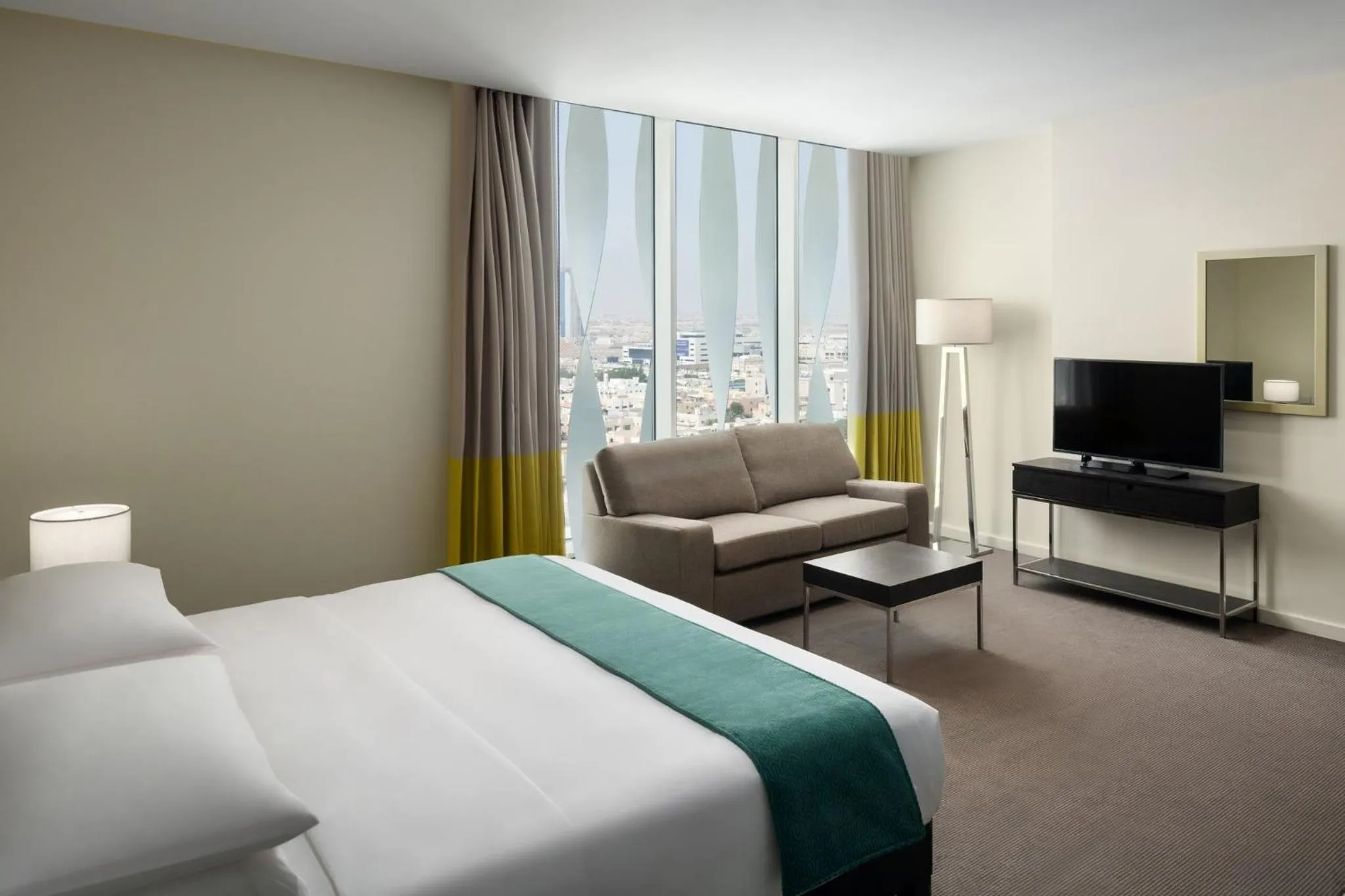 Photo of the whole room, Bed in Staybridge Suites Al Khobar by IHG