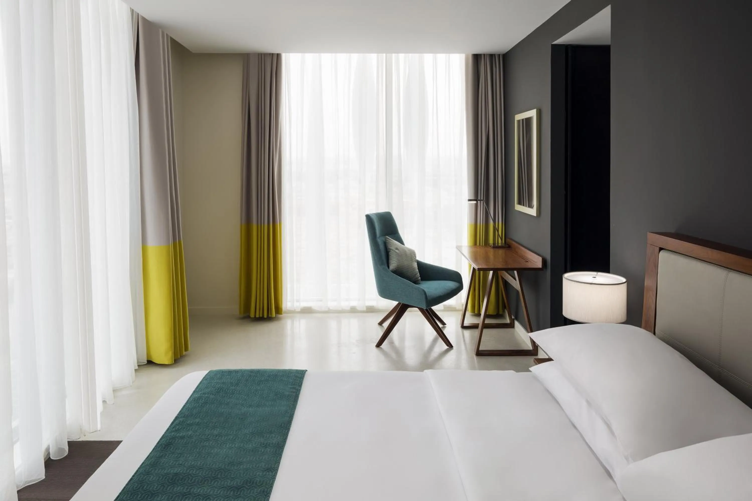 Photo of the whole room, Bed in Staybridge Suites Al Khobar by IHG