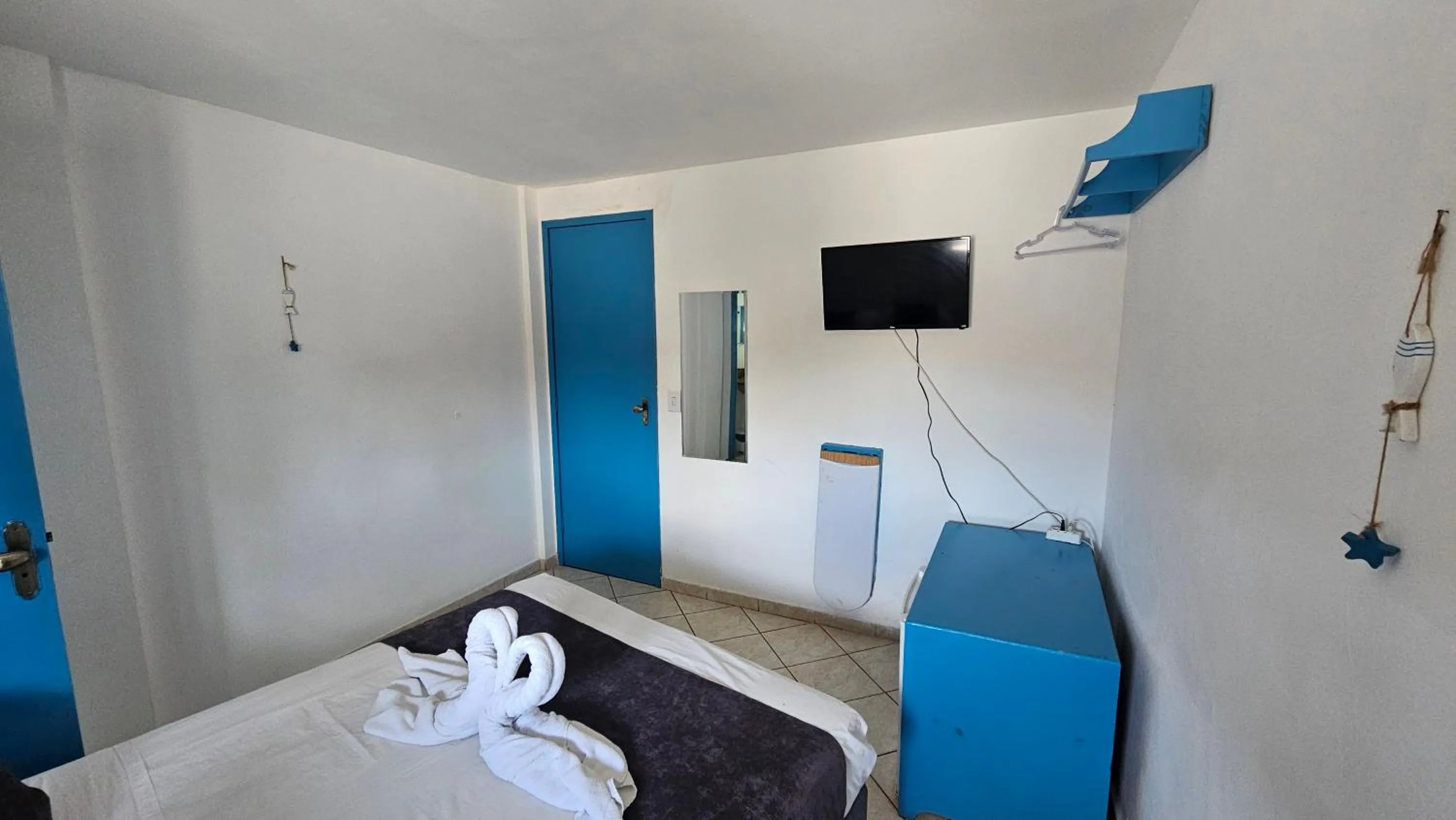 Bed in Pousada Mediterrânea