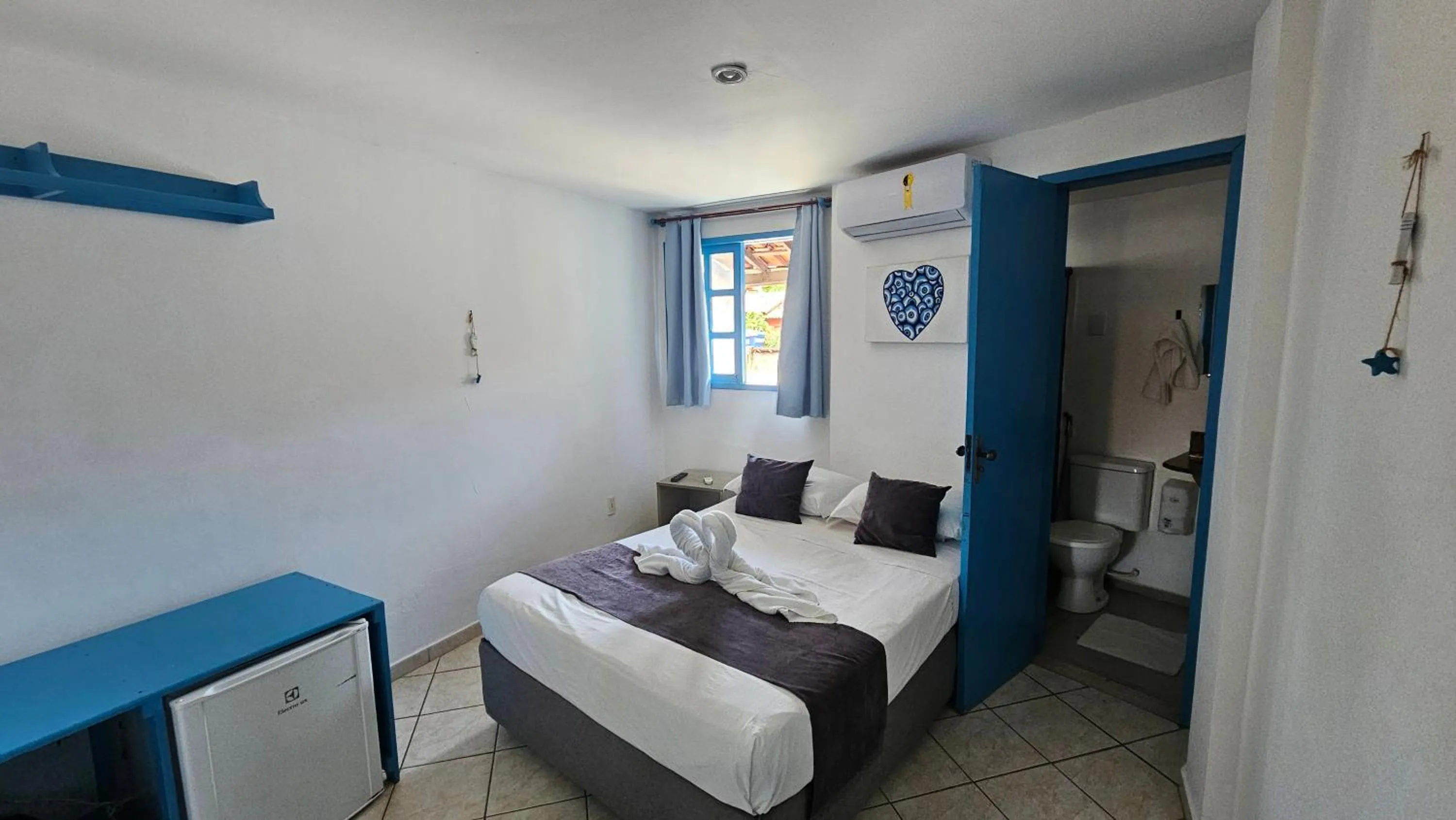 Bed in Pousada Mediterrânea