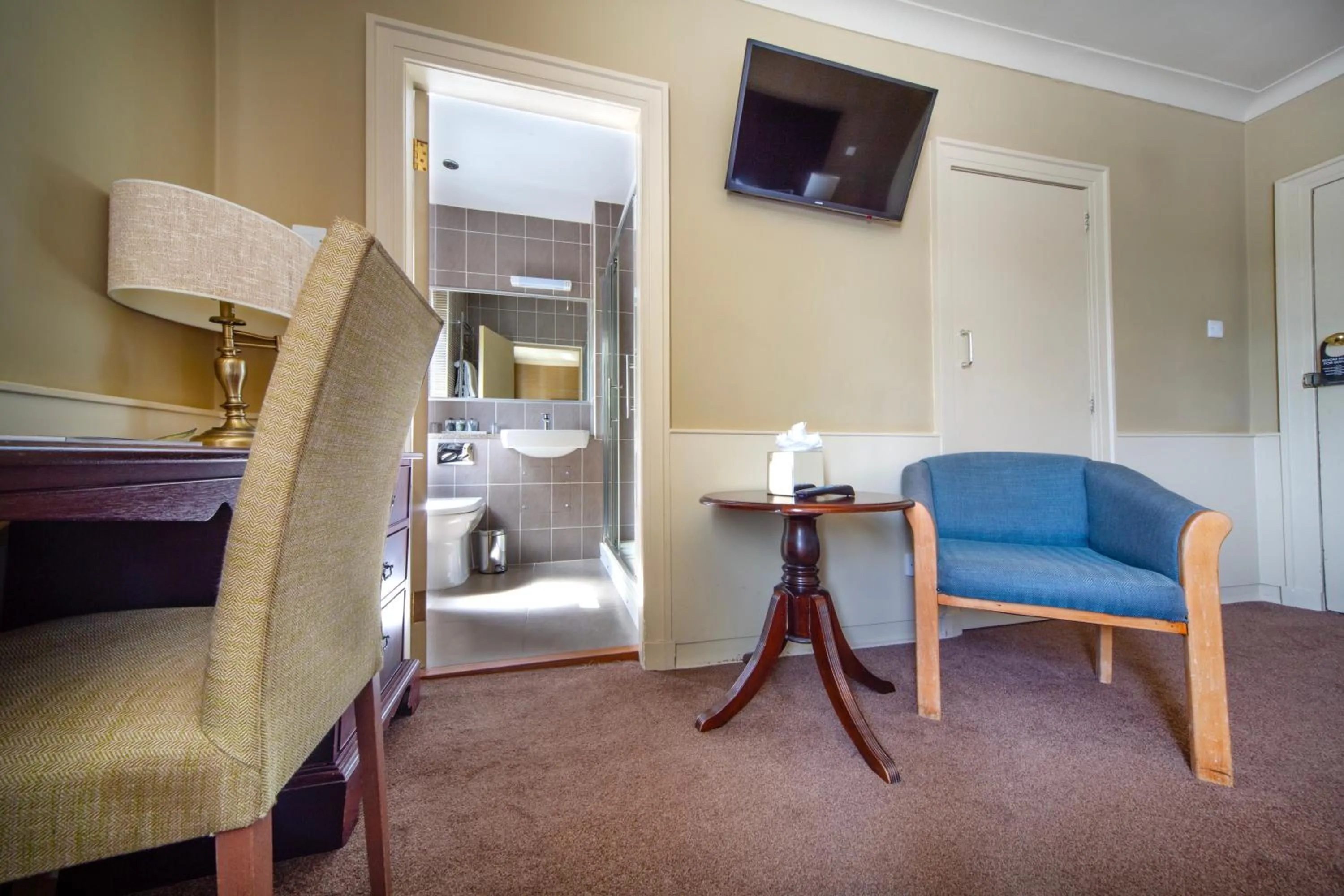 Bedroom in The Tontine Hotel