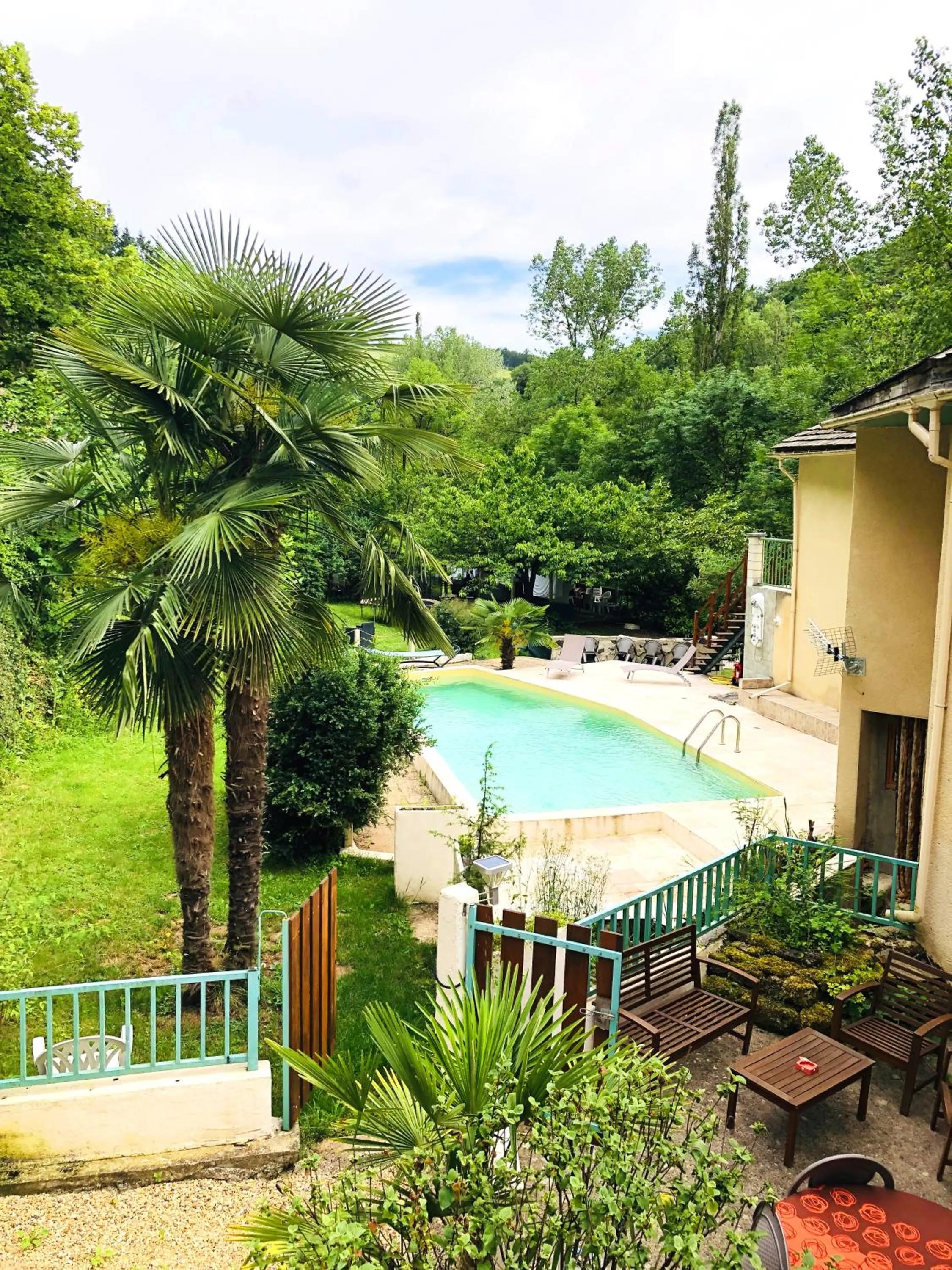 Garden in Hôtel Le Moulin D'Olt