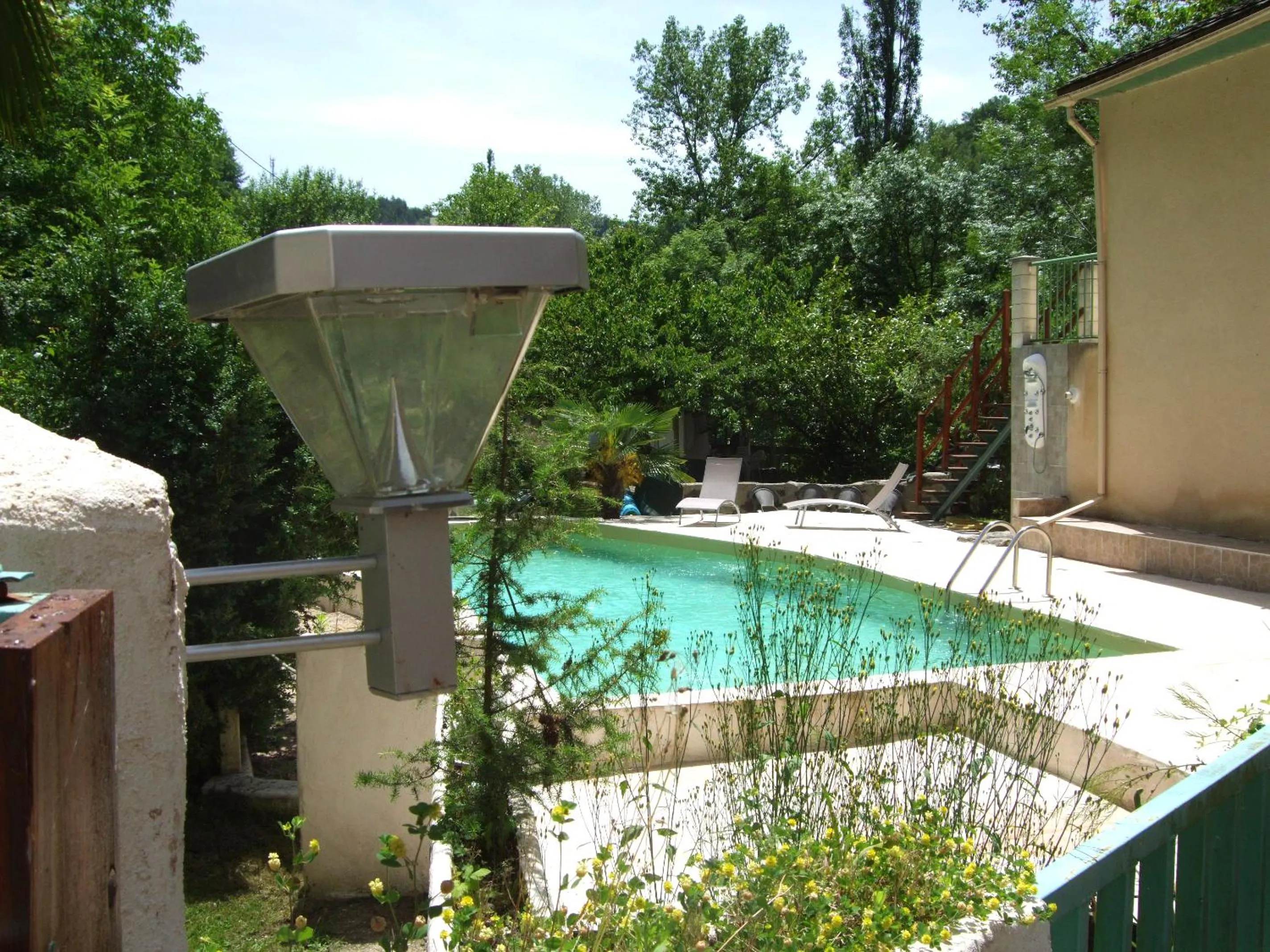 Pool view in Hôtel Le Moulin D'Olt