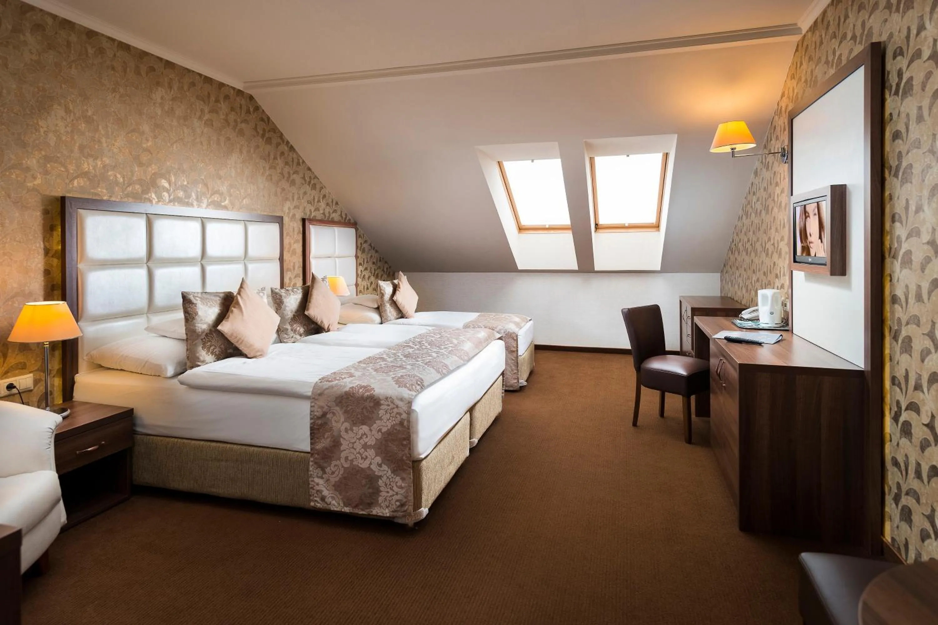 Bed in Aventinus Hotel