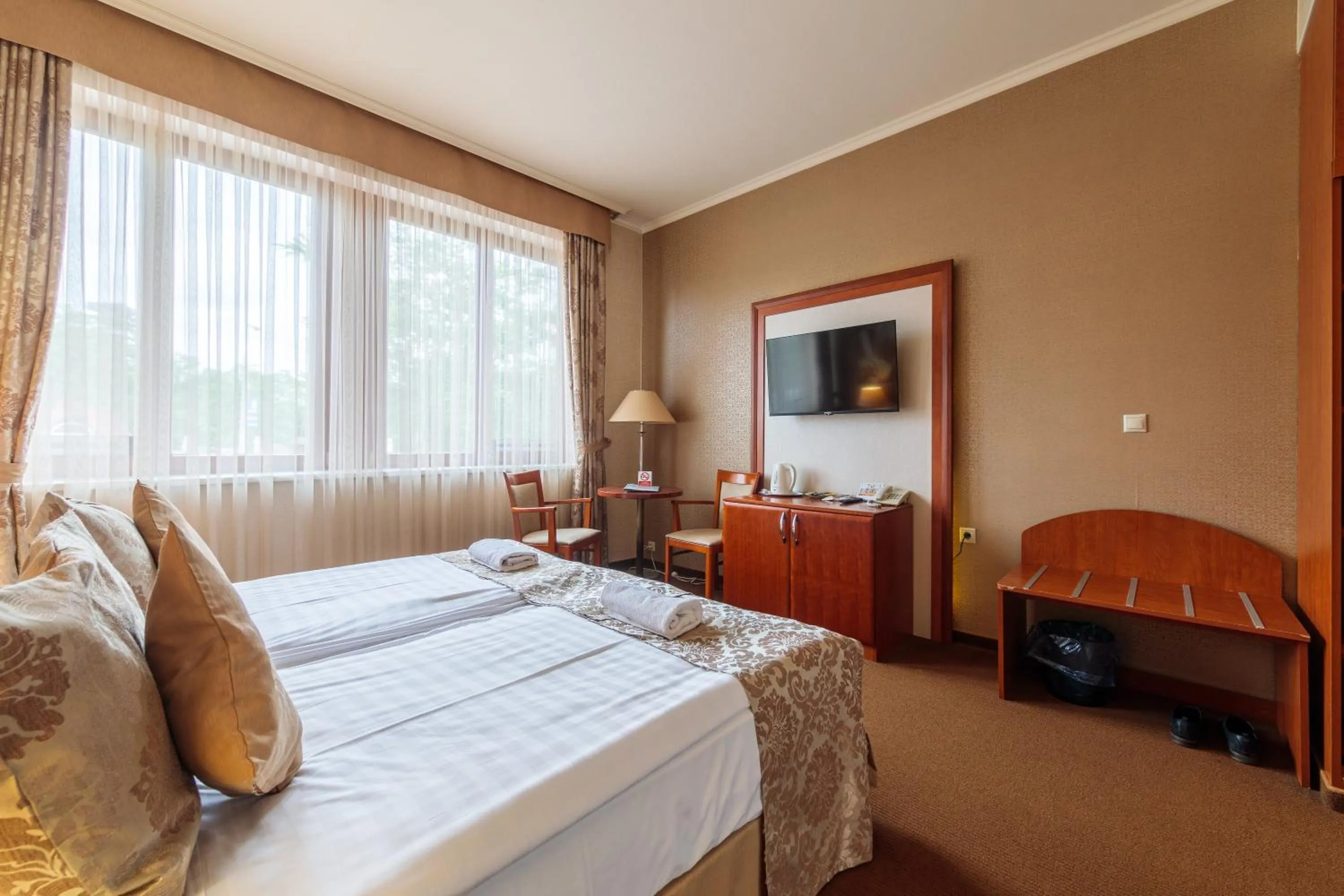 Bed in Aventinus Hotel