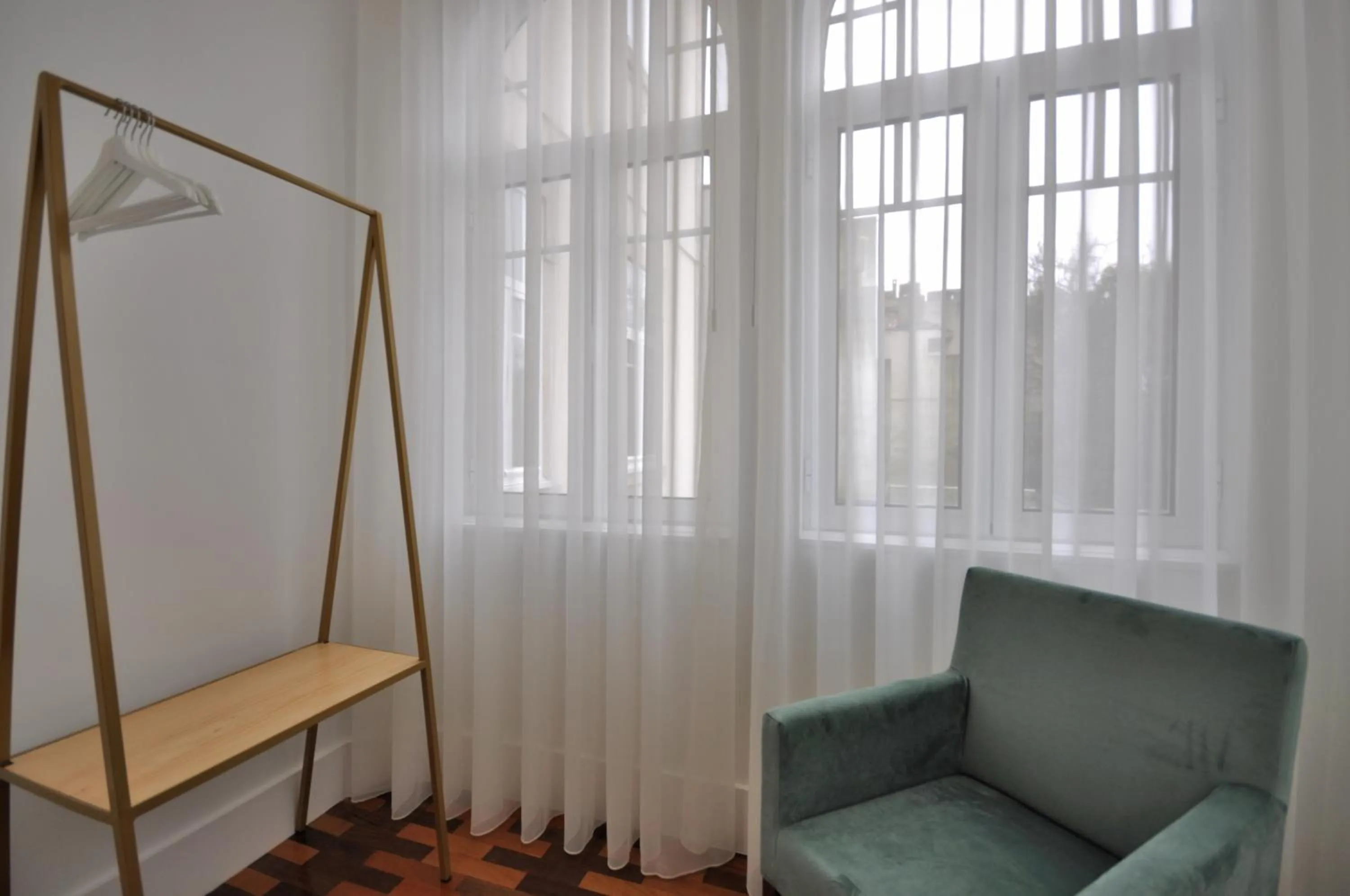 Bedroom in Porto Charming Hotel