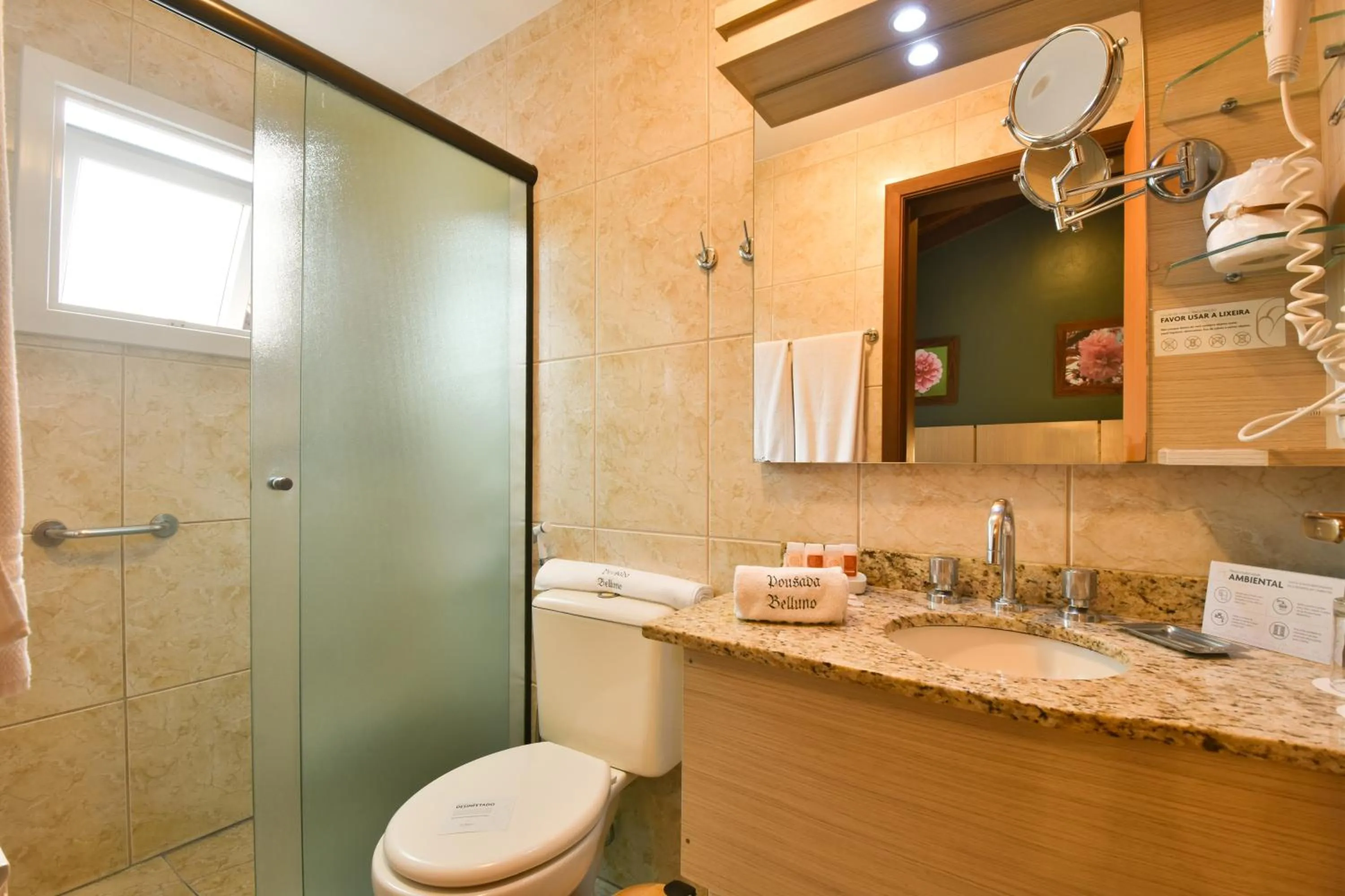 Toilet in Pousada Belluno