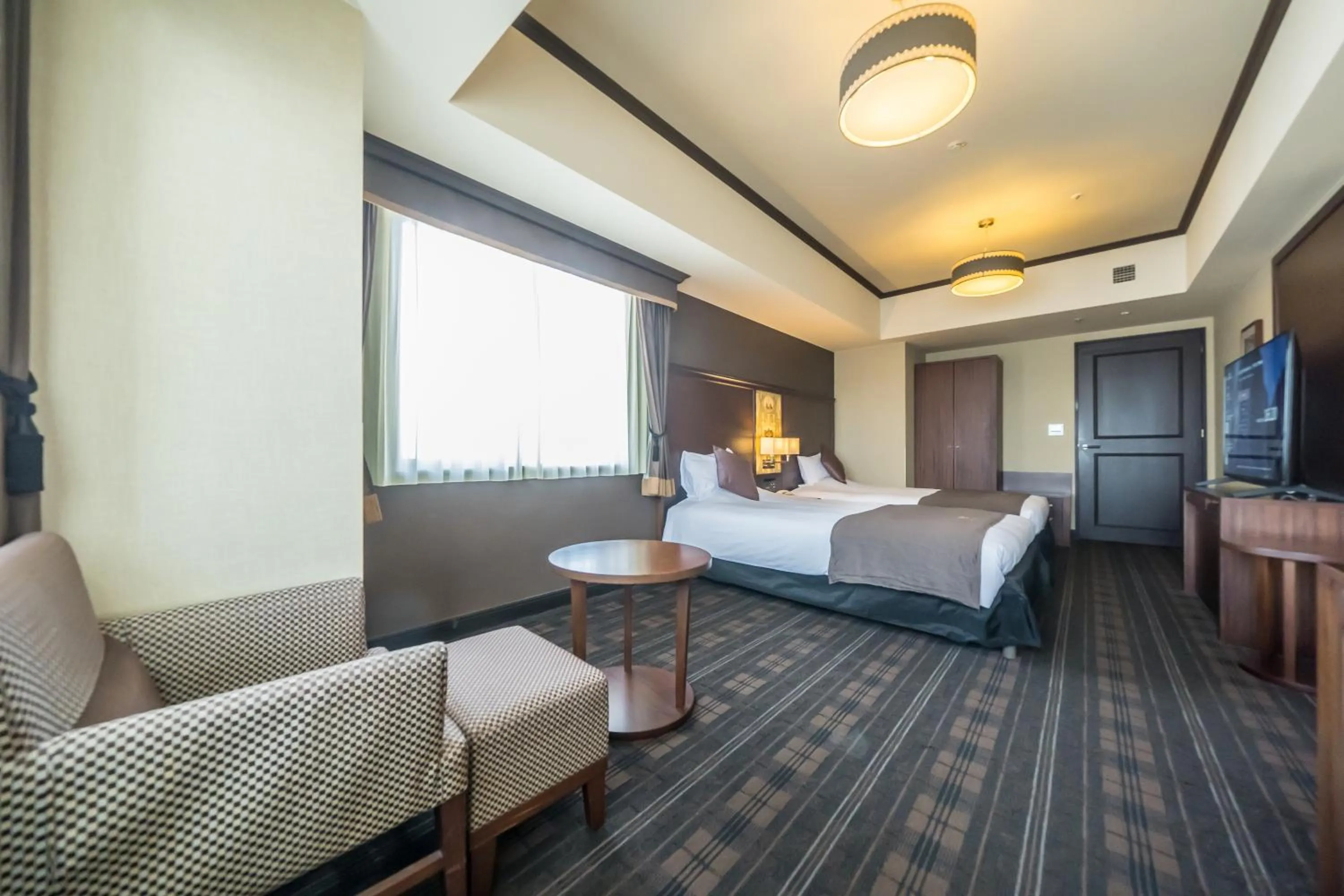 Photo of the whole room, Bed in Hotel Monterey Grasmere Osaka