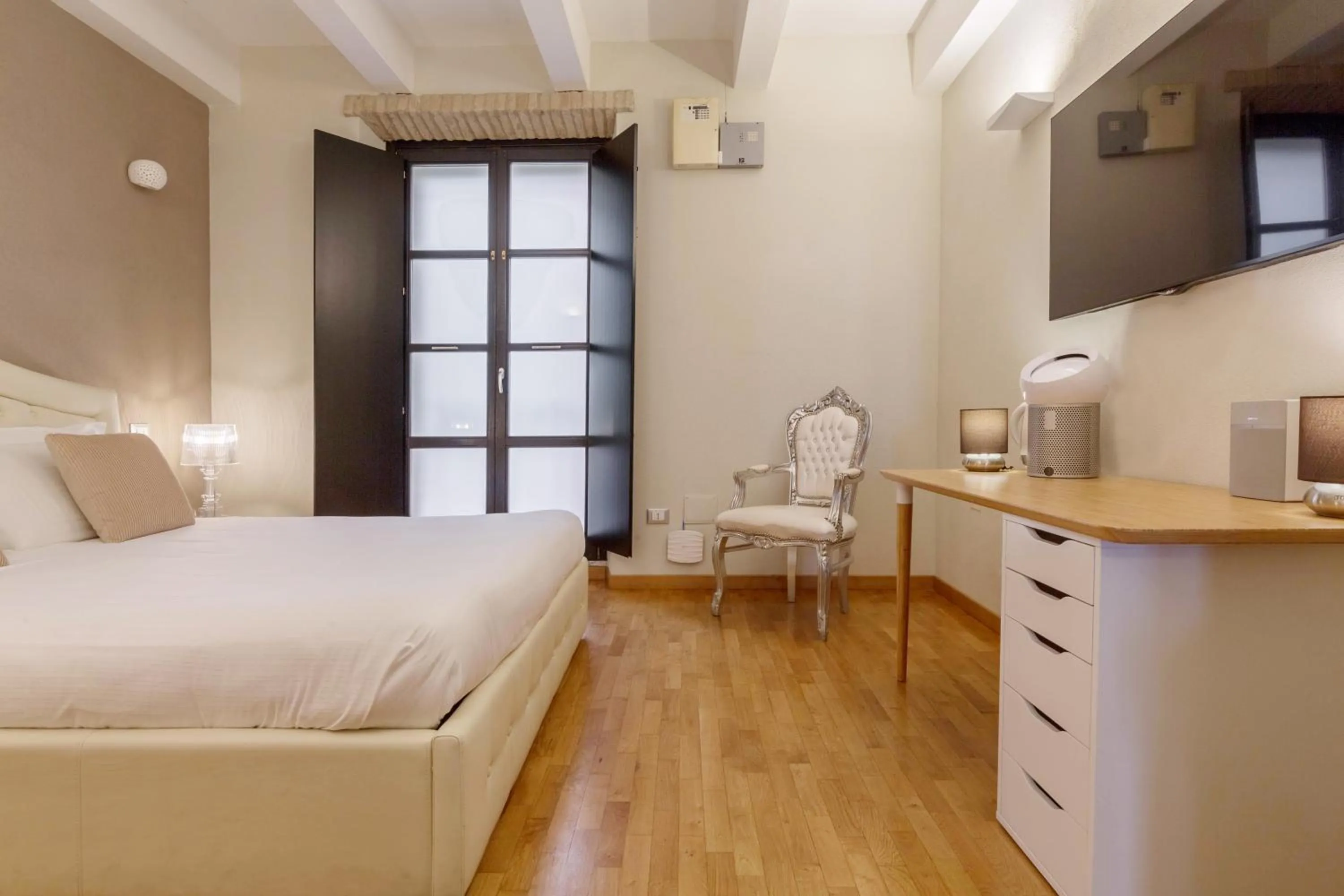 Bed in Martini Rooms Castello