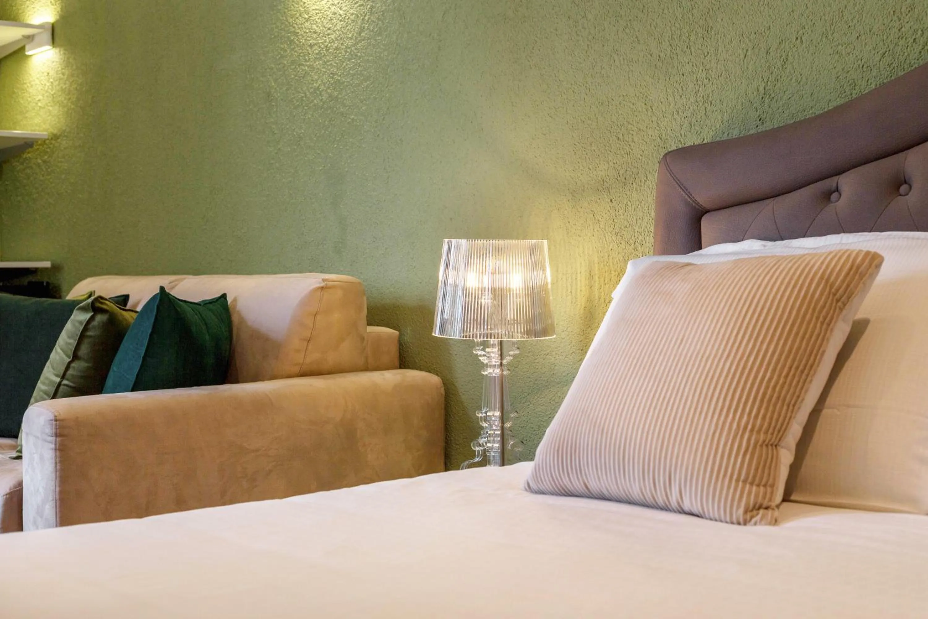 Bed in Martini Rooms Castello