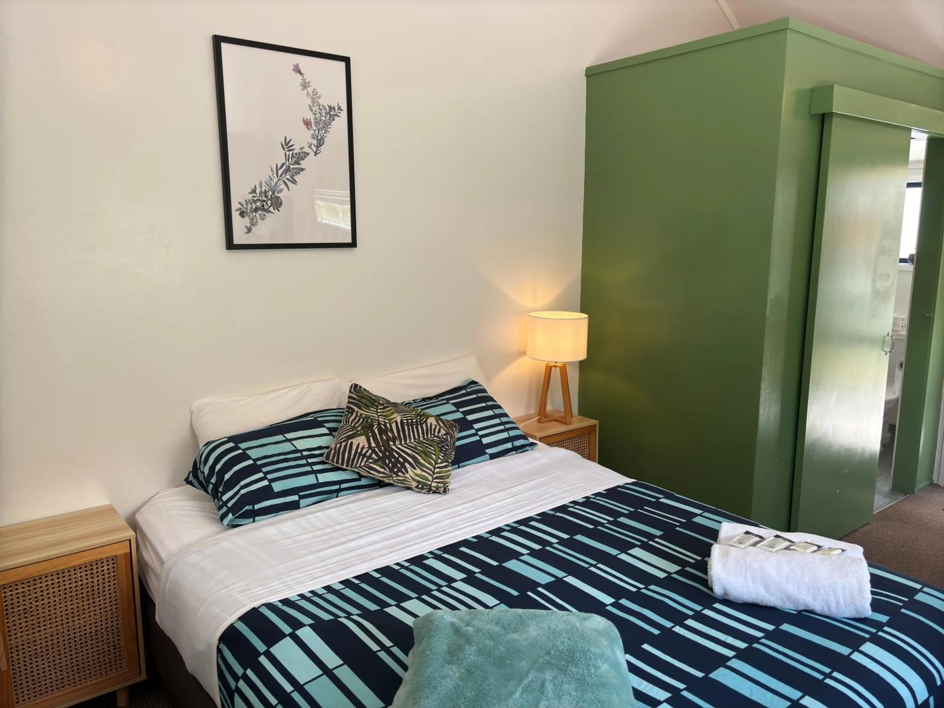 Bed in Peppertree Lodge