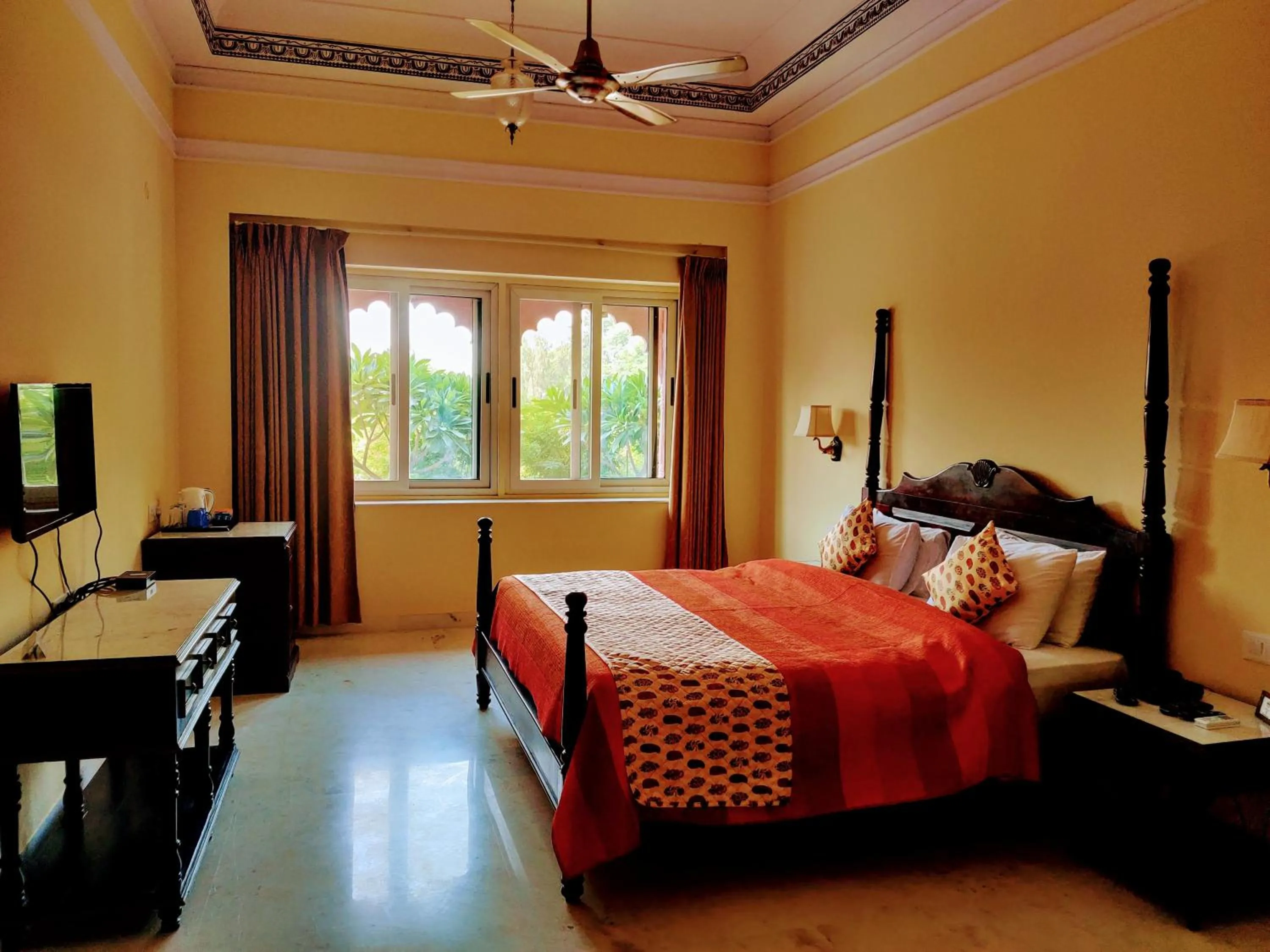 Photo of the whole room, Bed in Umaid Palace - A Lakeside Resort - 25 minutes from Mehandipur Balaji - 20 minutes from Chand Baori Stepwell Abhaneri & 40 minutes from Bhangarh Fort
