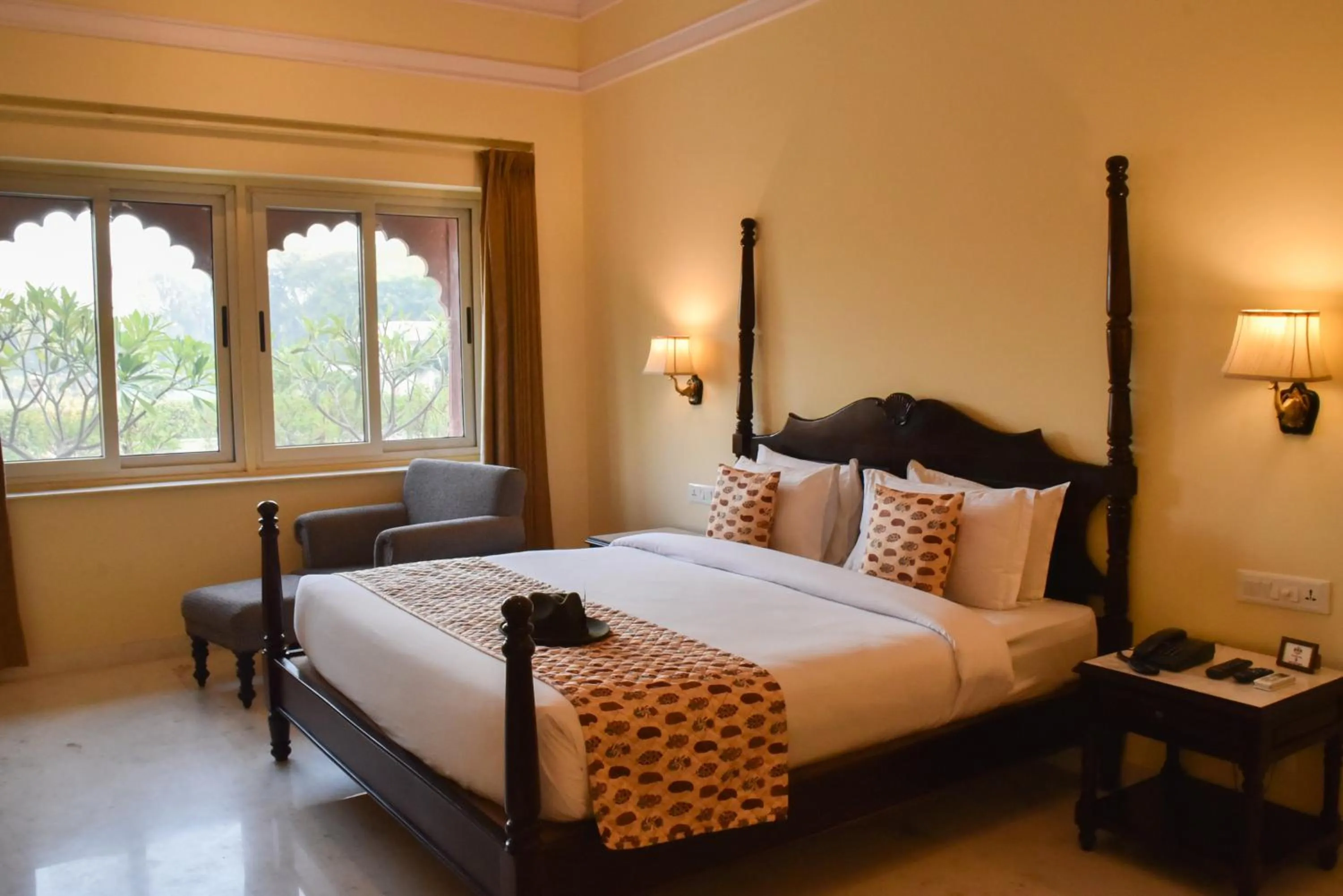 Bed in Umaid Palace - A Lakeside Resort - 25 minutes from Mehandipur Balaji - 20 minutes from Chand Baori Stepwell Abhaneri & 40 minutes from Bhangarh Fort