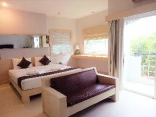 Bed in Khuang Singh Residence & Hotel Chiangmai