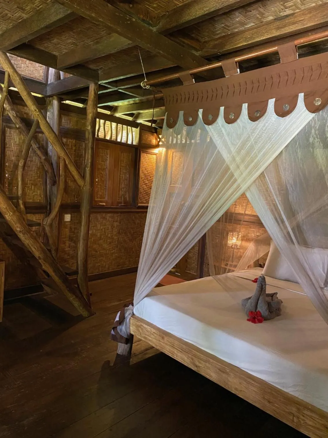 Bed in Flower Bud Bungalow Balangan