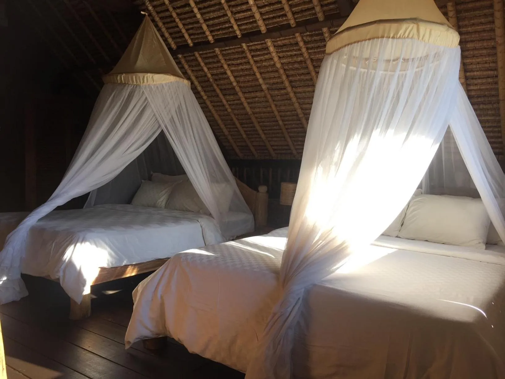 Bed in Flower Bud Bungalow Balangan