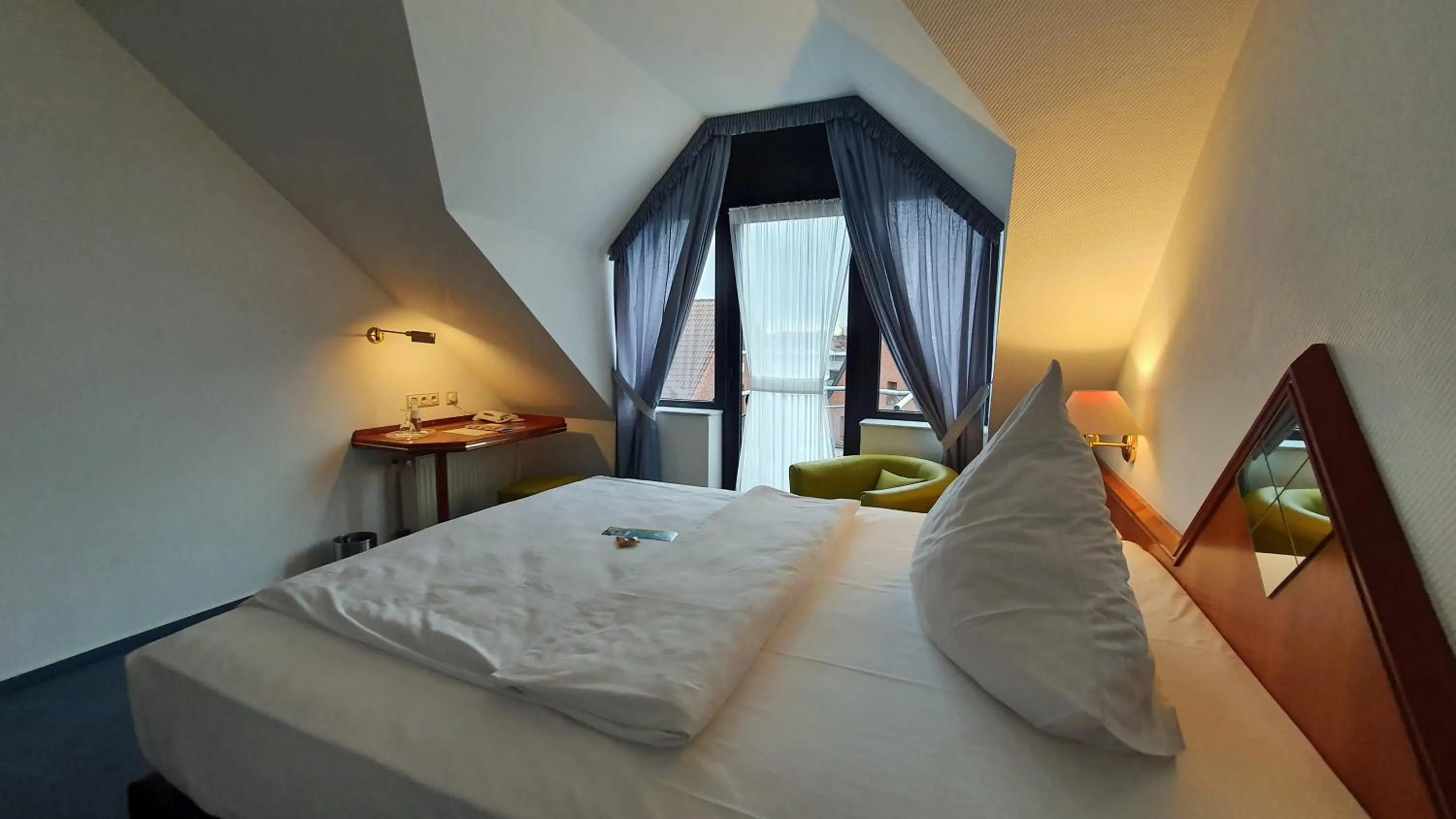 Photo of the whole room, Bed in AKZENT Hotel Merfelder Hof