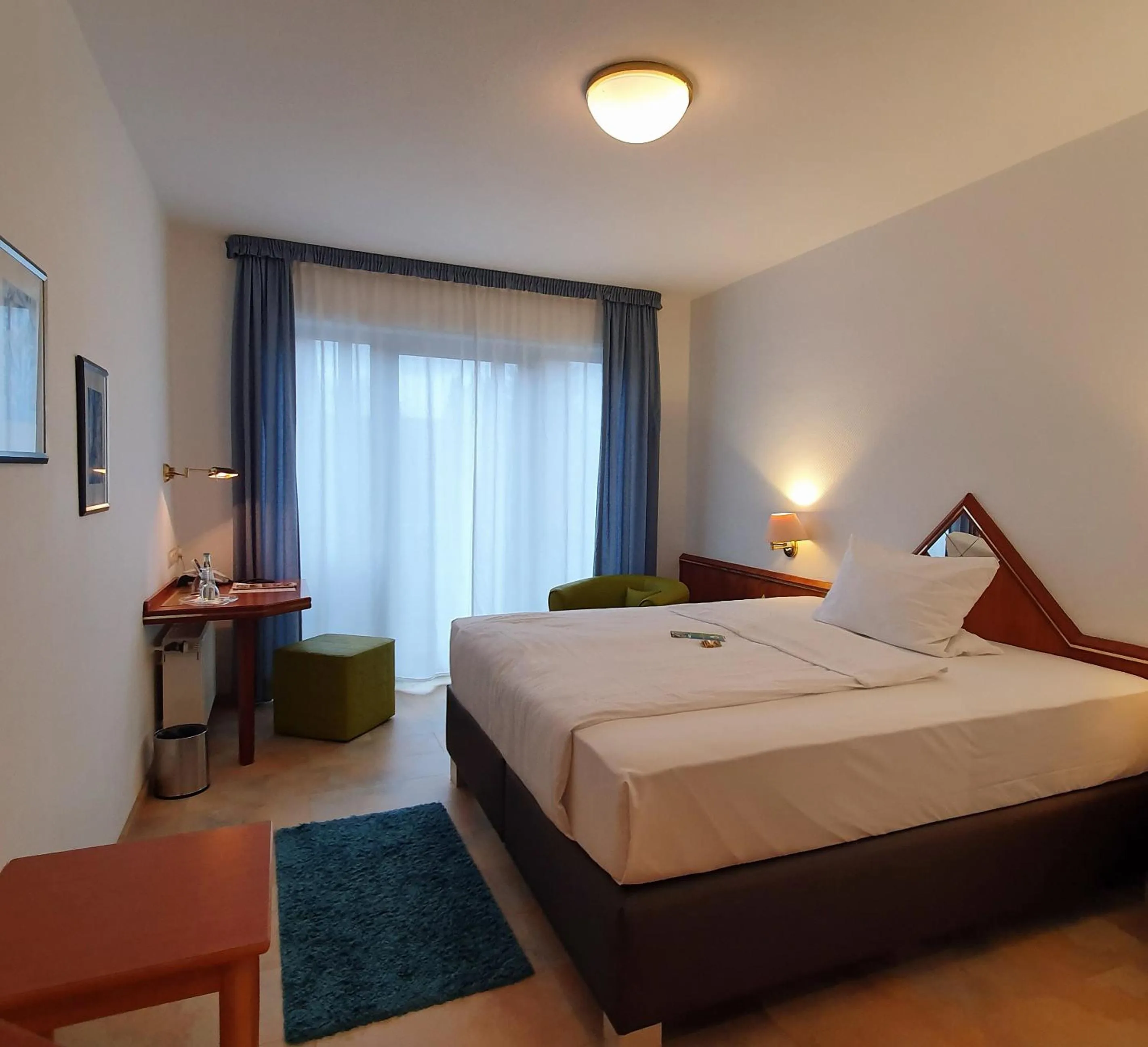 Photo of the whole room, Bed in AKZENT Hotel Merfelder Hof