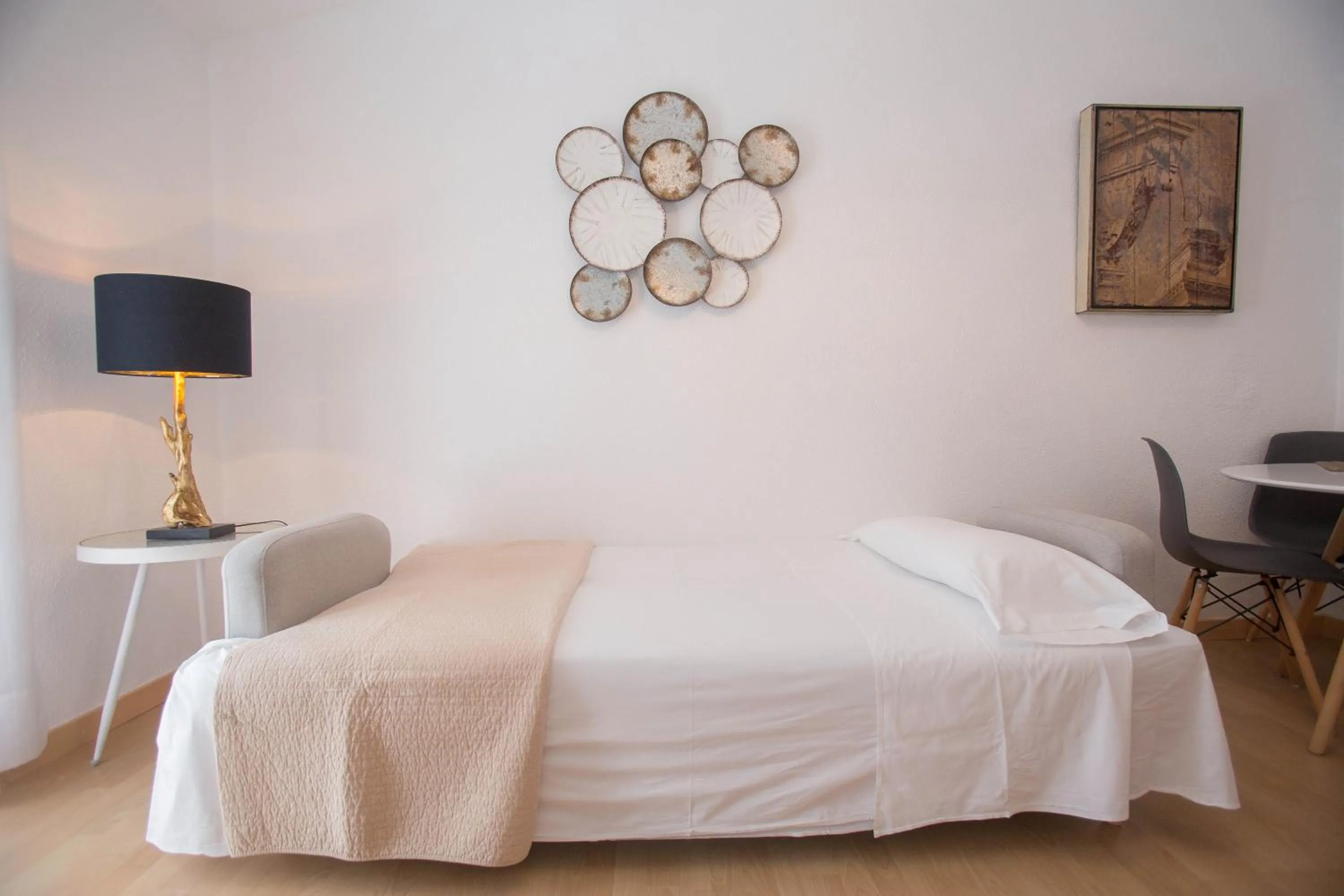 Living room, Bed in Apartamentos Soho Boutique Plaza Mayor Caceres
