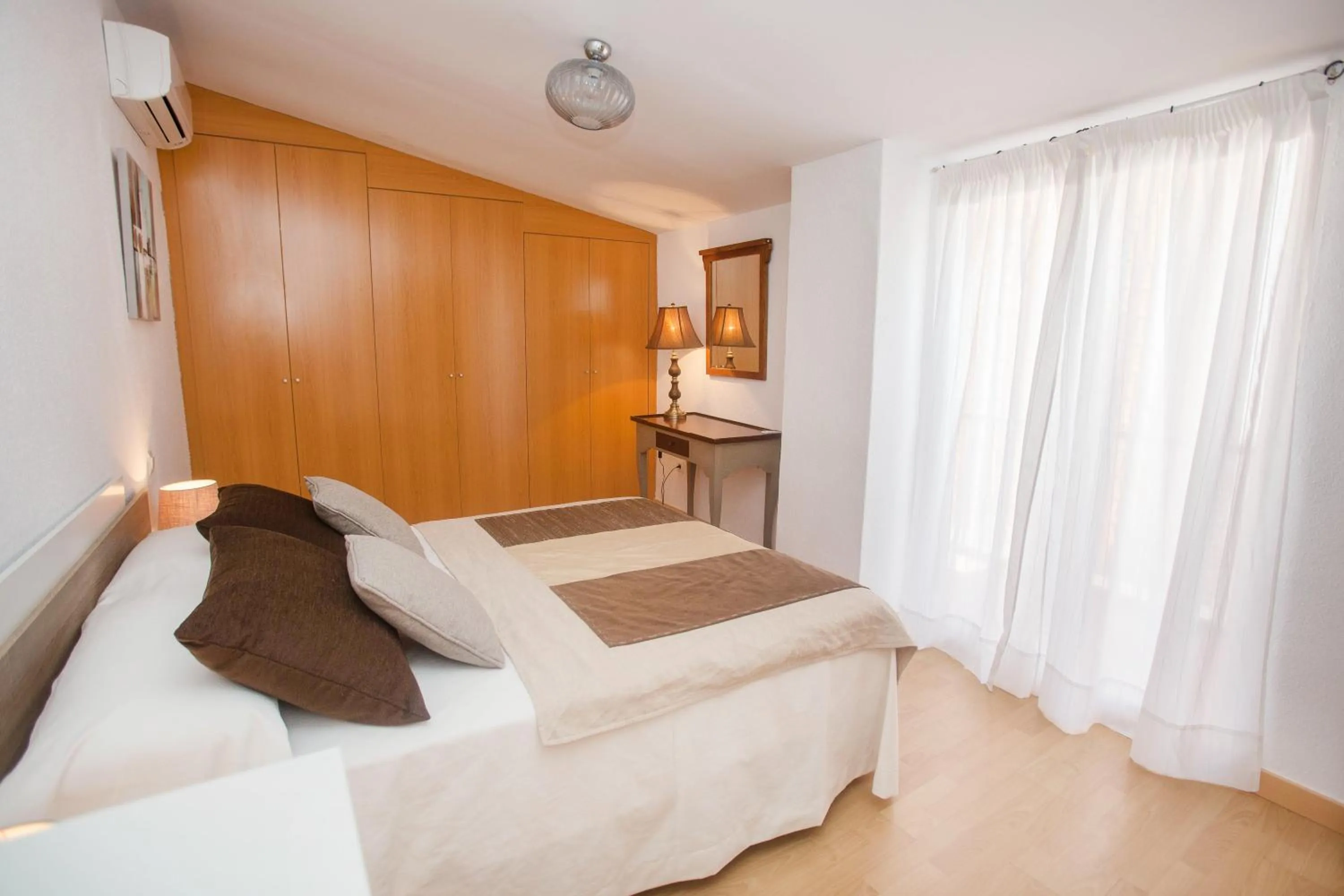 Bedroom, Bed in Apartamentos Soho Boutique Plaza Mayor Caceres