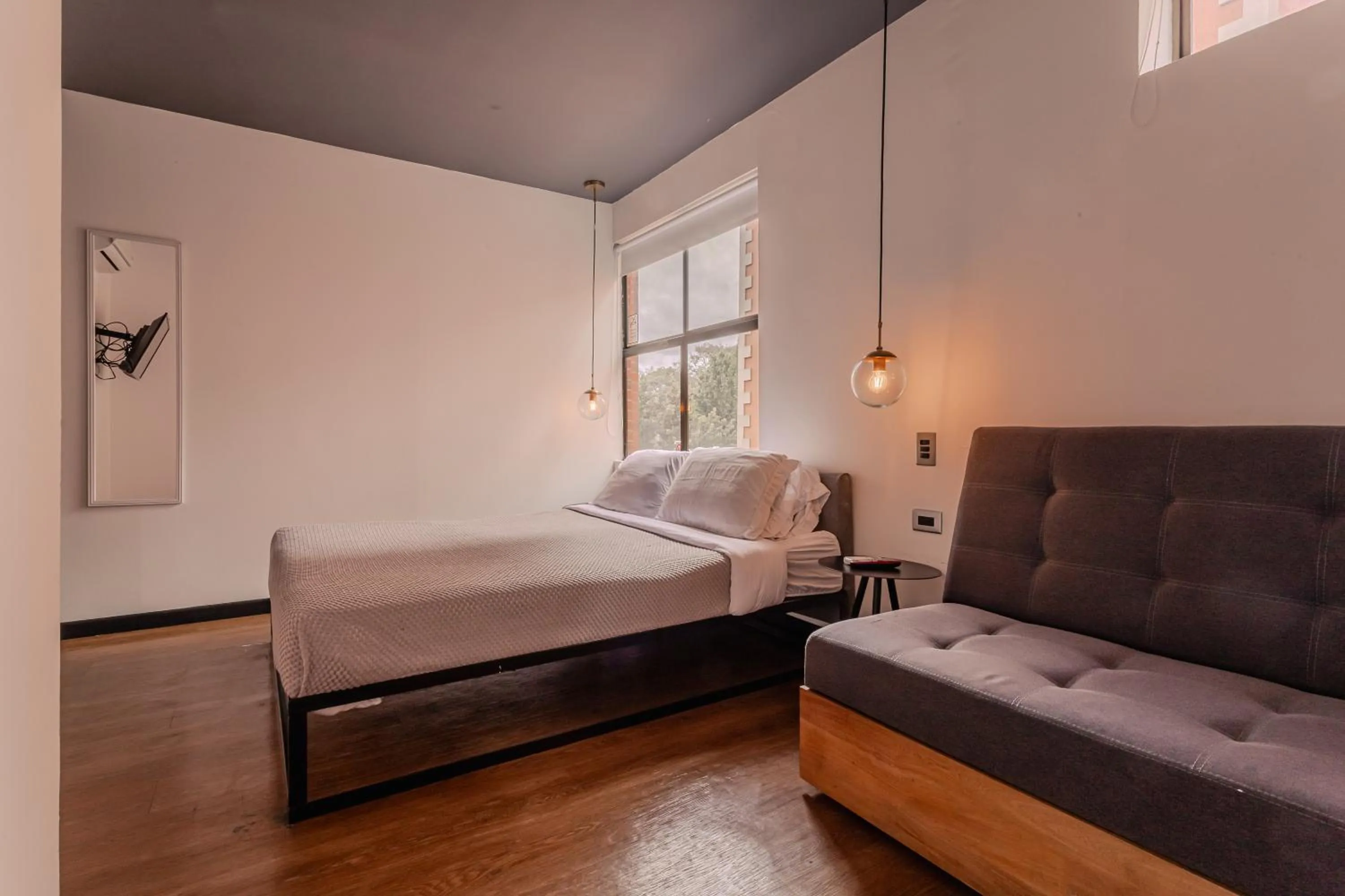 Photo of the whole room, Bed in Soy Local Parque La 93